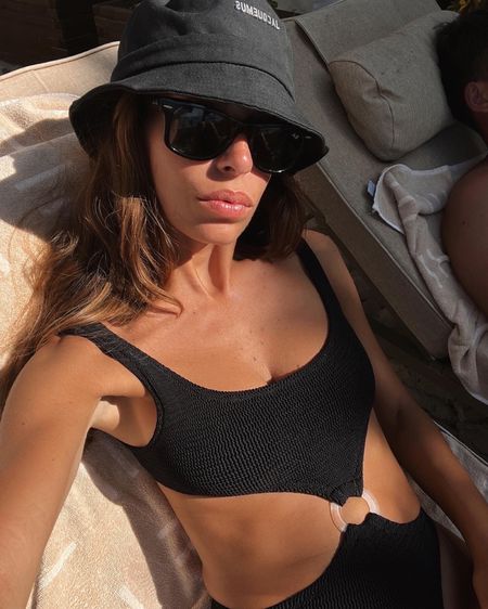 Ibiza Beach look 🌞🖤

outfit inspiration, holiday outfit, summer outfit, black cut out swimsuit, Reina Olga, Jacquemus bucket hat, Luisaviaroma, Farfetch, Rayban wayfarer classic. 

#LTKswim #LTKSeasonal #LTKeurope