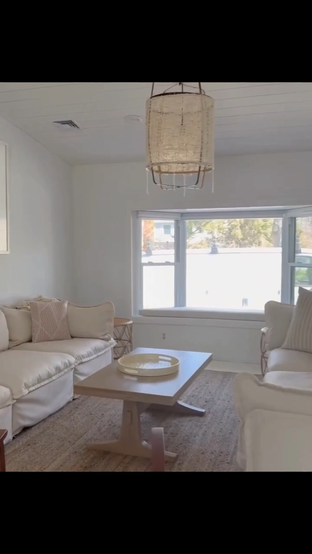 One of my renovation rules is to invest more heavily in the things that stay with the house and are difficult to replace, while keeping furniture and decor more flexible over time.

For this space, we painted the wood floors white, added shiplap to the ceiling, installed a ceiling fan and statement pendant, swapped the curtains for woven shades, mounted an Art TV, and painted the front door black.

Linking a mix of exact and similar sources from the room.

#LTKActive #LTKHome #LTKSaleAlert