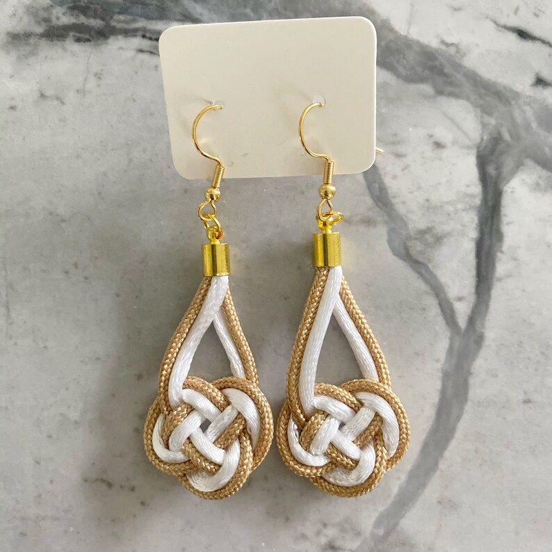 Knotical earrings gold/white | Etsy (US)