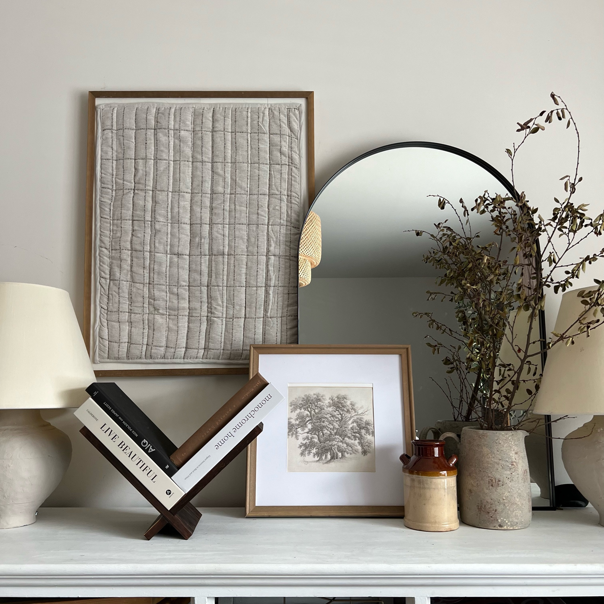 Side board styling, coffee table book display, diy pillowcase art, arch tabletop mirror, arch wall mirror, vintage sketch art, vintage art prints, tabletop decor, coffee table decor books

#LTKsalealert #LTKfindsunder50 #LTKhome