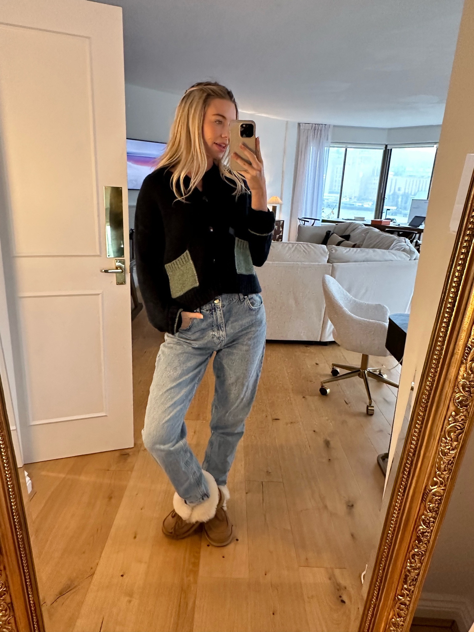 Black cardigan with pockets, blue jeans, ugg boots

#LTKstyletip #LTKSeasonal #LTKeurope