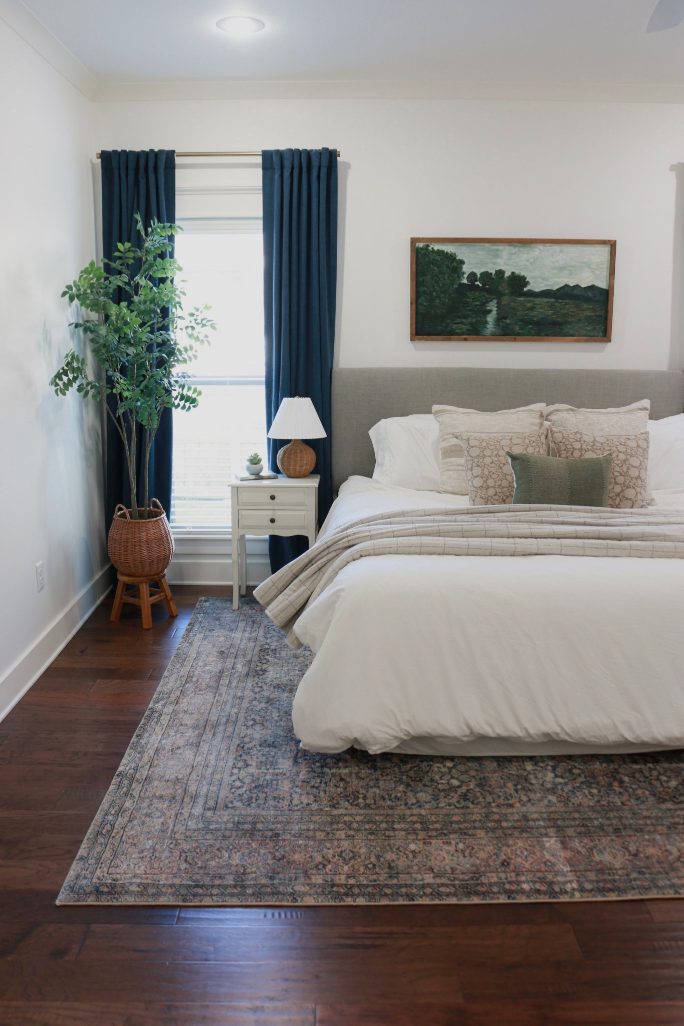 Shop our master bedroom here. 

I can’t say enough good things about the mattress. We’ve had it almost a year now & would 100% buy it again and again. Best decision ever! 

Also, our rug is one of my favorite things about the room. The colors are perfection & it’s really soft under foot. 

I linked the throw pillows & bedding that is still available, our faux tree & the deep blue blackout curtains. 

#LTKHome