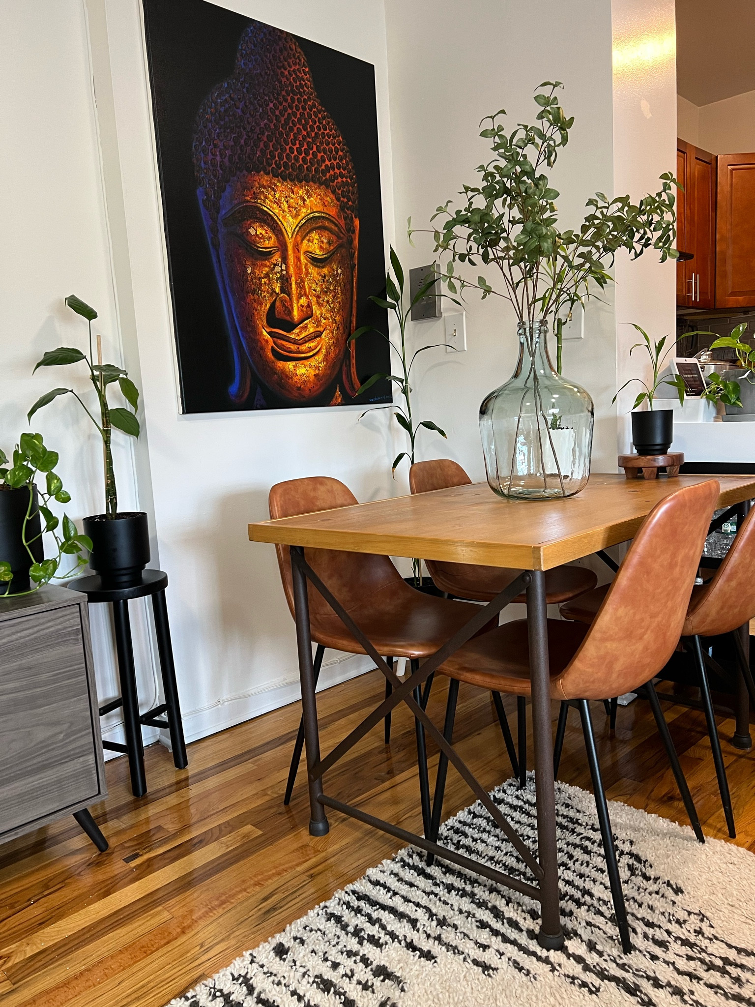 1. Tabletop jug is a Marshall’s find.
2. Buddha painting is a purchase in Thailand. 

All of my plants are real except for branches in jug. ✨

#LTKFindsUnder50 #LTKFindsUnder100 #LTKHome