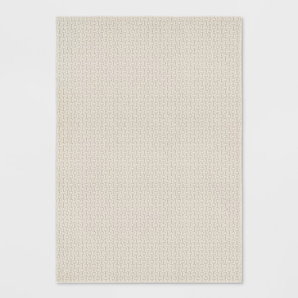 7'x10' Washable Solid Machine Tufted Area Rug Tan - Threshold™ | Target