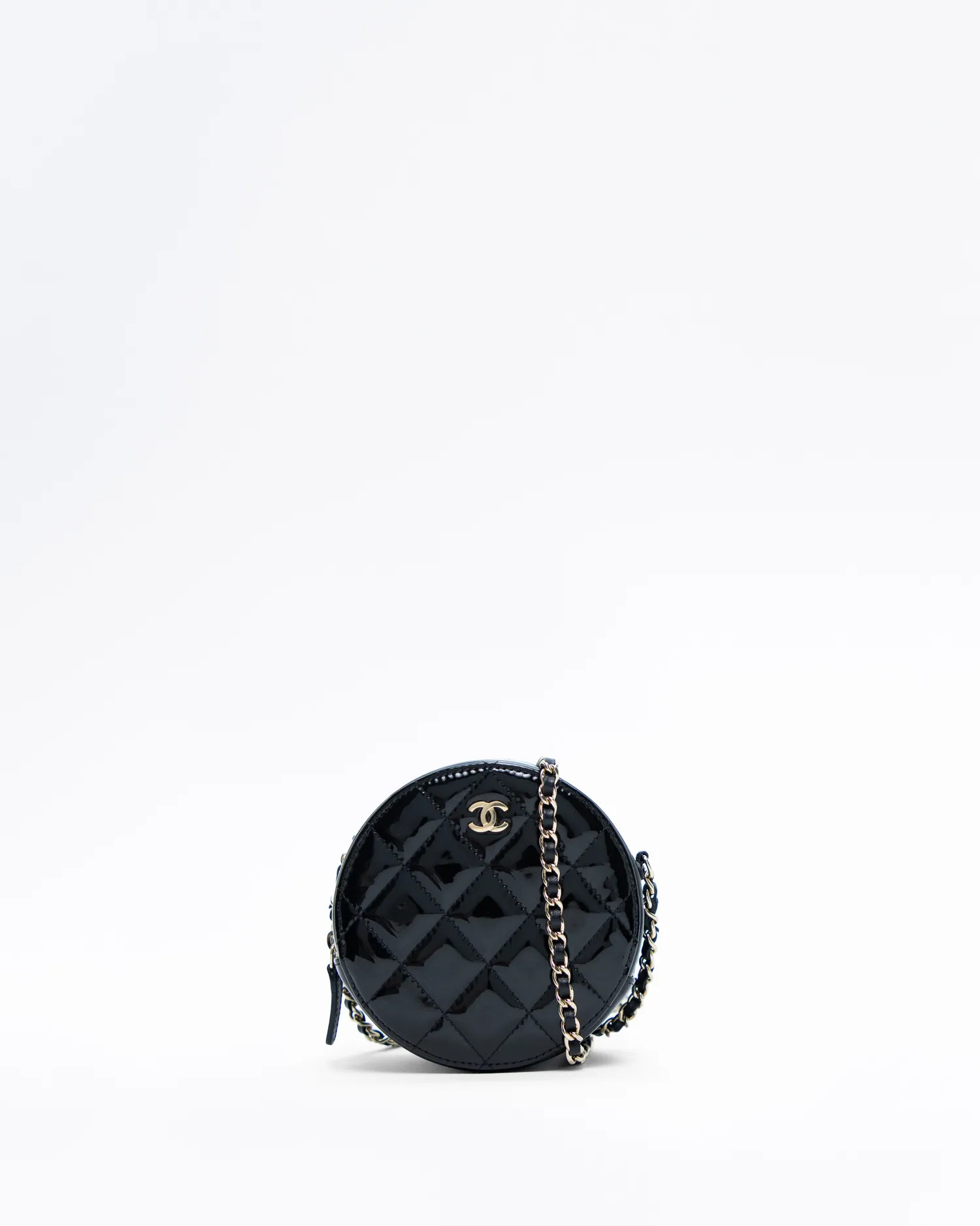 Patent Quilted Round Mini Pouch | Vivrelle