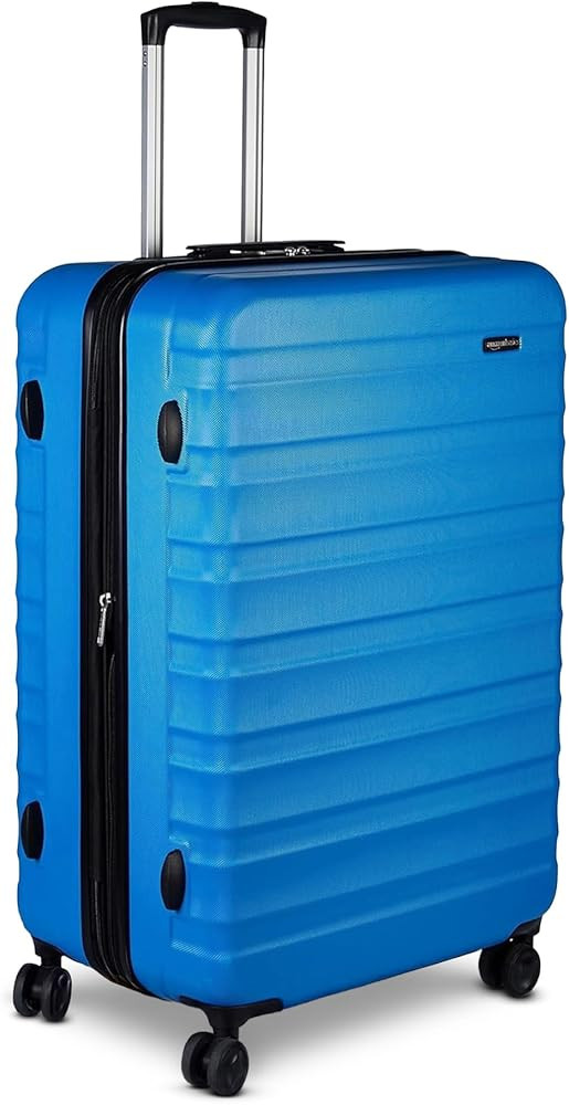 Amazon Basics 30" Hardside Large Checked Luggage, Expandable For Up to 15% More Space, With Scrat... | Amazon (US)