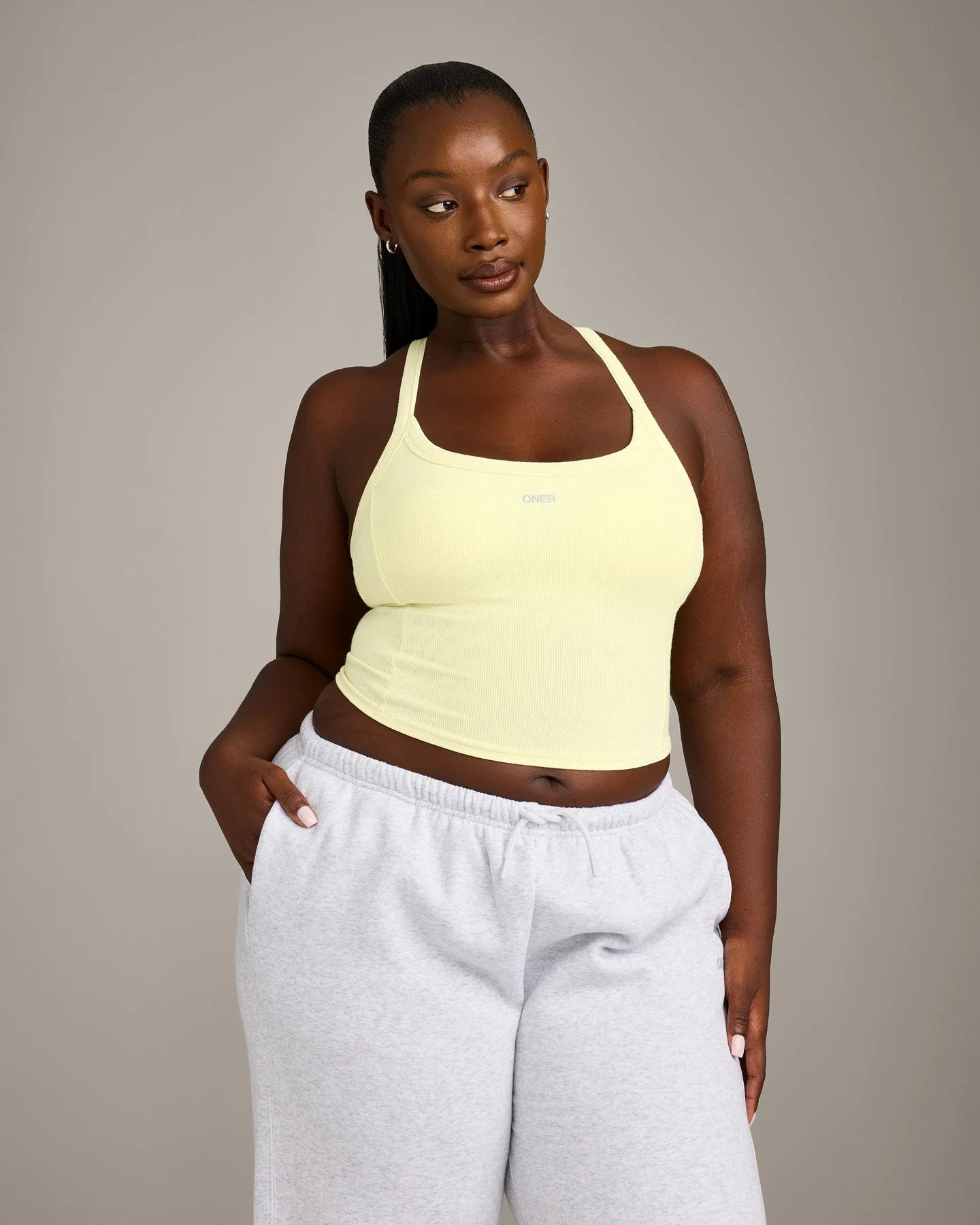 Mellow™ Rib Racer Back Mid Tank Top with Built in Bra Shelf 
 Pastel Yellow | Oner Active (UK / US)