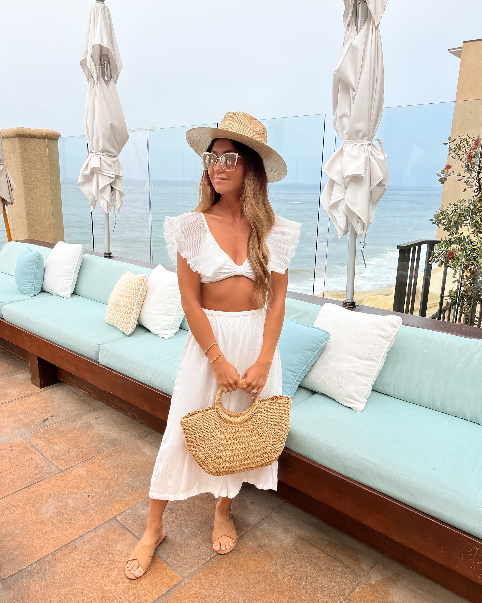 Resort vacation outfit - love this cute ruffle bikini top from Amazon! Styled it with some lightweight cropped beach pants for a cute resort look!

// travel outfit, summer outfit, summer fashion, vacation outfit, vacation style, resort wear, beach outfit, pool, vacay, swimsuit, swim, bikini, beach pants, culotte pants, white pants, wide leg pants, cover up pants, straw hat, summer hat, straw fedora, woven beach bag, beach tote, straw bag, Lack of Color, DIFF eyewear, Amazon fashion, Amazon swimwear, Amazon swimsuit, Amazon bikini (9.5)

#liketkit #LTKFind #LTKU #LTKunder50 #LTKstyletip #LTKunder100 #LTKSeasonal #LTKitbag #LTKtravel