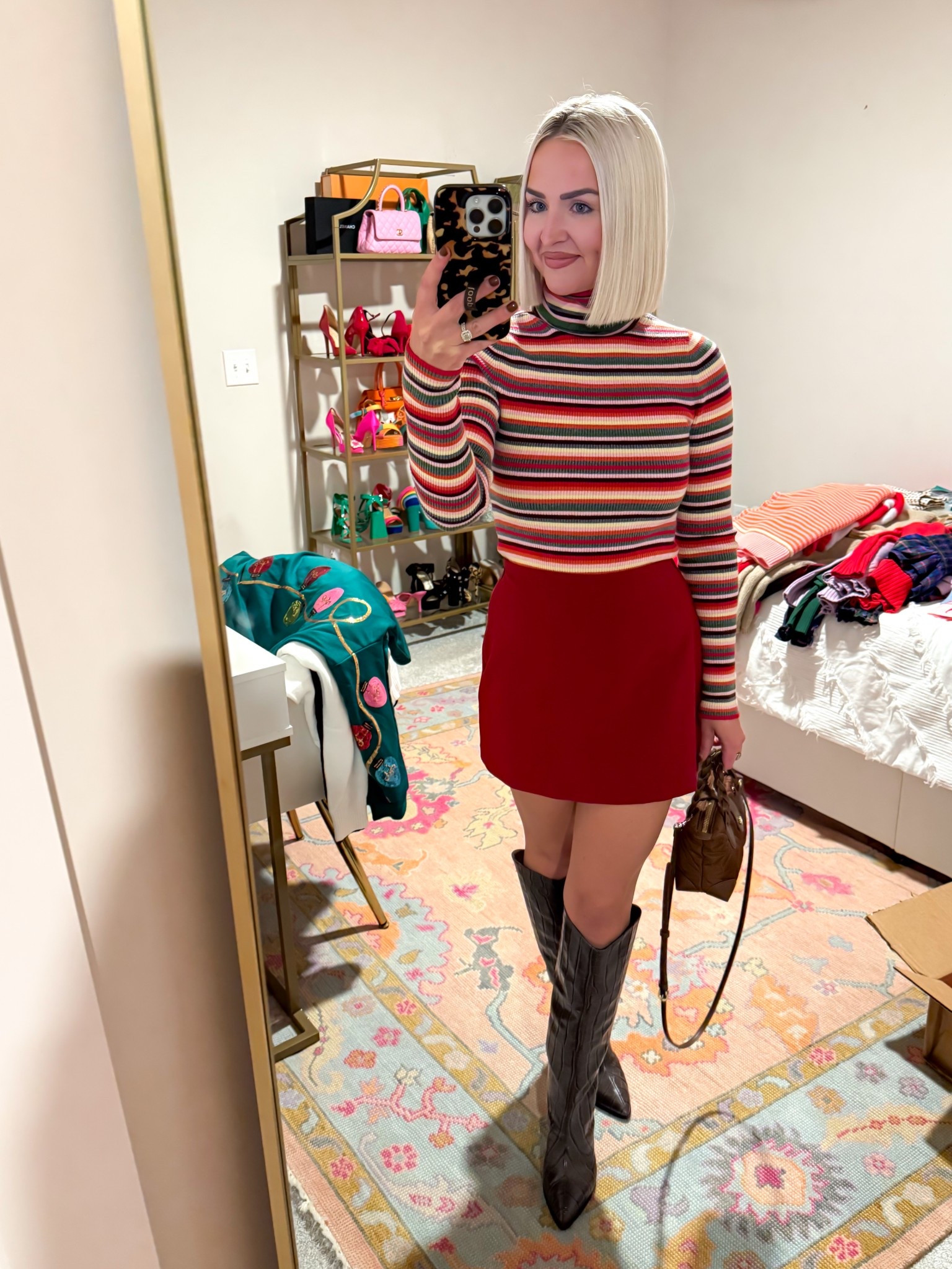 Stripe turtleneck sweater (XS) / multicolored sweater / mini skort / dark brown knee high boots / date night 

#LTKPetite #LTKStyleTip #LTKSeasonal