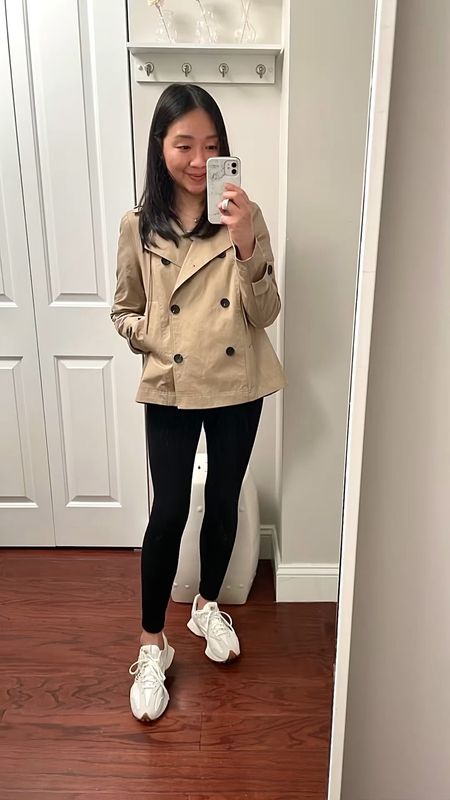 So glad I found this trench jacket in store for less ($59.99) at TJ Maxx! Hopefully it will be on their online website soon.

Note: I linked to it on the retailer's website for reference where it's still full price.

Short cotton blend trench, which features an attached hood, welt pockets, and a water-resistant shell. It also has slight a hi-lo hem and vented curved hem in the back for added interest.

It's a swingy relaxed fit on me in size XS. The shoulders are narrow in this size compared to the Steve Madden Sirus cropped trench which I also reviewed.

The 23.5" sleeves are long but I don't mind since I have longer arms despite being petite.

For size reference I'm 5' 2.5" and 110 pounds. 

#LTKVideo #LTKSeasonal #LTKover40