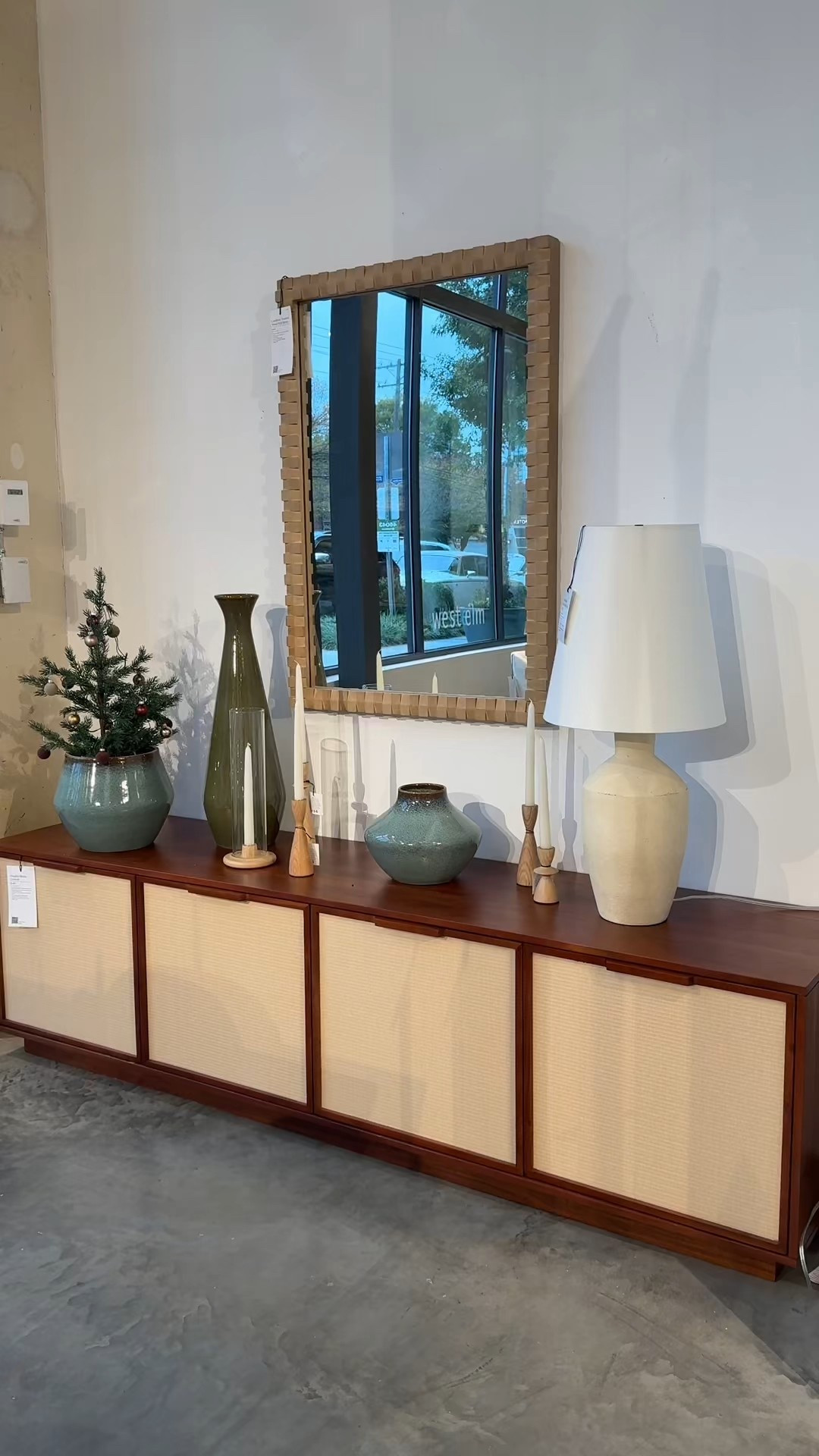 Loving this modern, effortless vibe! 🤎 The Douglas Solid Wood Tatami Media Console instantly elevates the room — clean lines, woven tatami texture, spacious hidden storage, and that simple-but-stylish look West Elm does so well. Paired here with the Cantilever Textured Wood Wall Mirror for a balanced, minimalist moment that still feels warm and inviting. Linking both pieces + a few coordinating decor finds! ☺️ #WestElmStyle #ModernHomeInspo #MidcenturyModern

#LTKHome #LTKHoliday #LTKSaleAlert