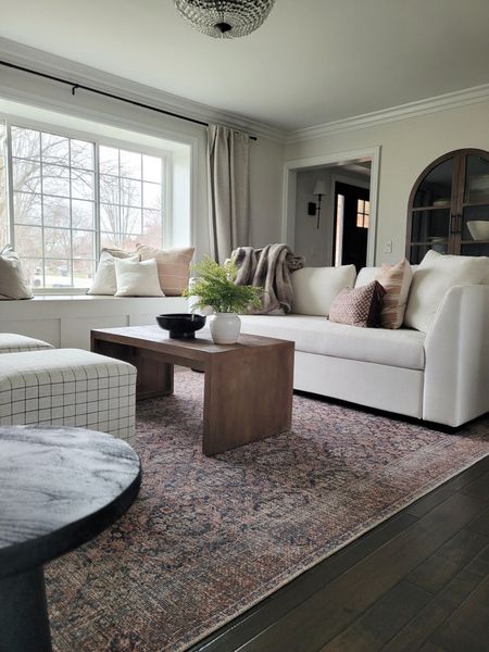 Living room with the prettiest vintage inspired rug and arch cabinet!

#LTKhome #LTKsalealert