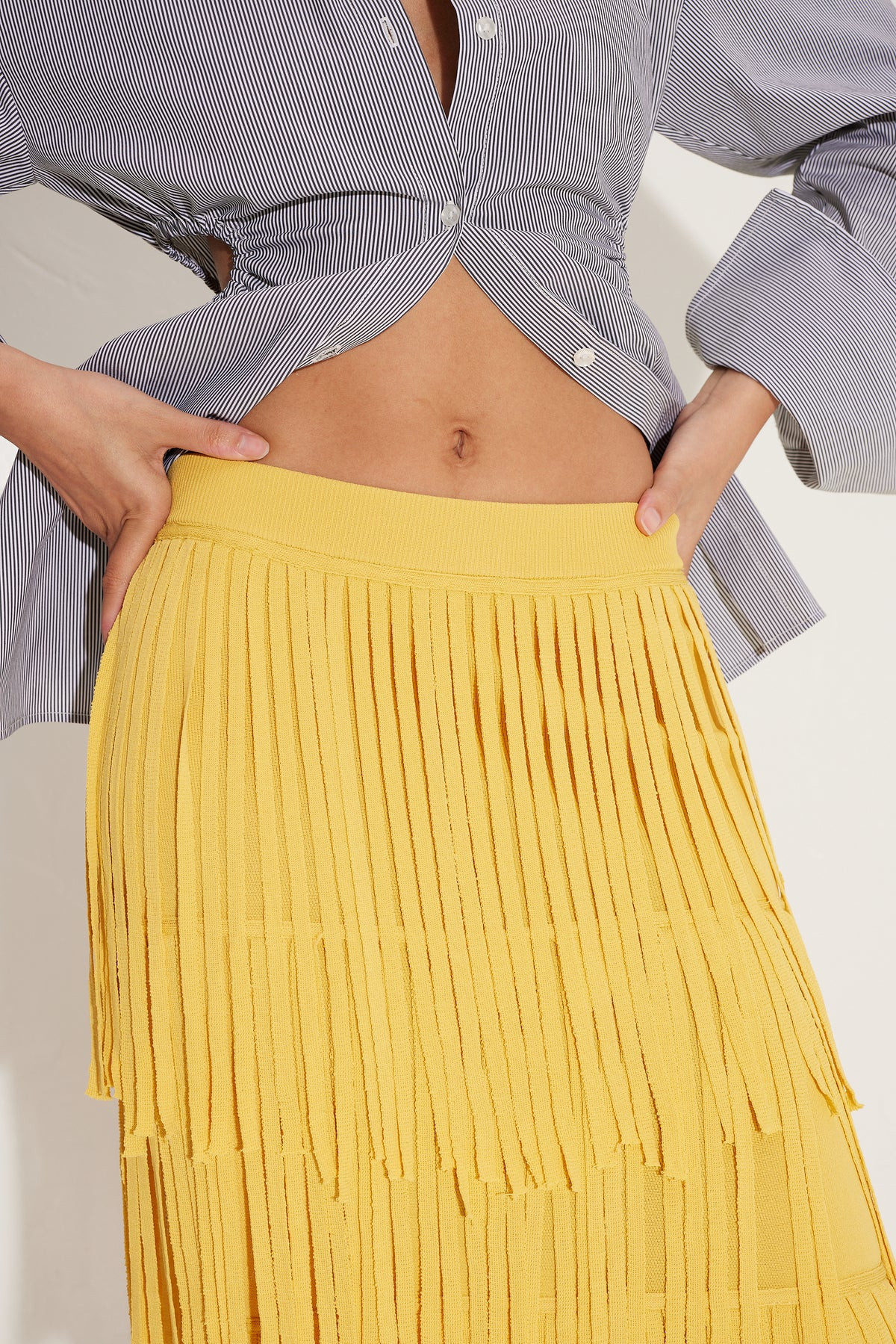 Za
           Knit Fringe Skirt in Butter | Simon Miller