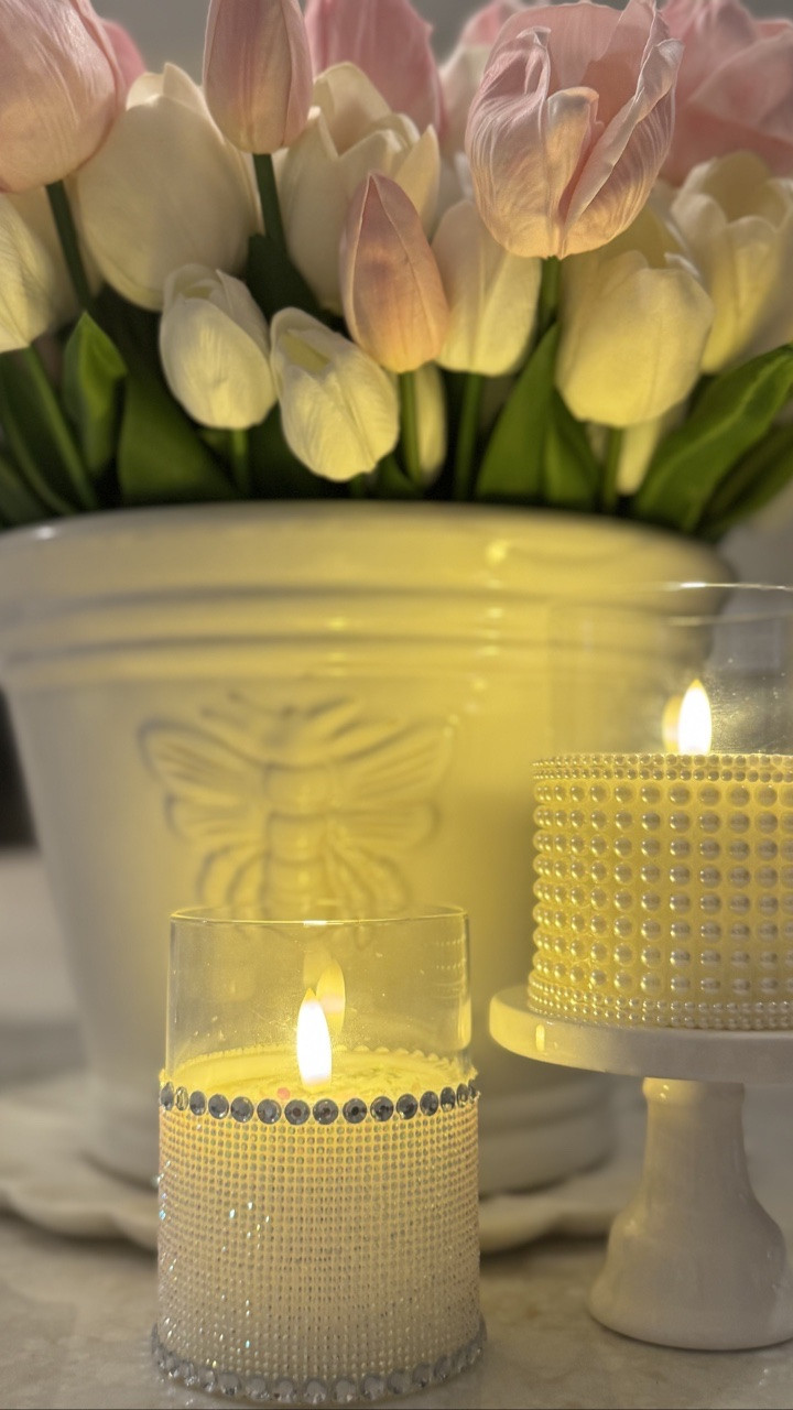 Soft candlelight + a little sparkle = the easiest way to create an elegant cozy glow ✨🕯️

These DIY glam candles were so simple to make using rhinestone wrap, glass candle holders, and a few pretty spring touches. Perfect for a dining table, coffee table, bridal shower, or Mother’s Day decor 💕

If you want the supplies I used, check out my LTK page for all the links — link in bio! ✨

Save this idea for your next decor refresh!

#LTKHome #LTKSeasonal