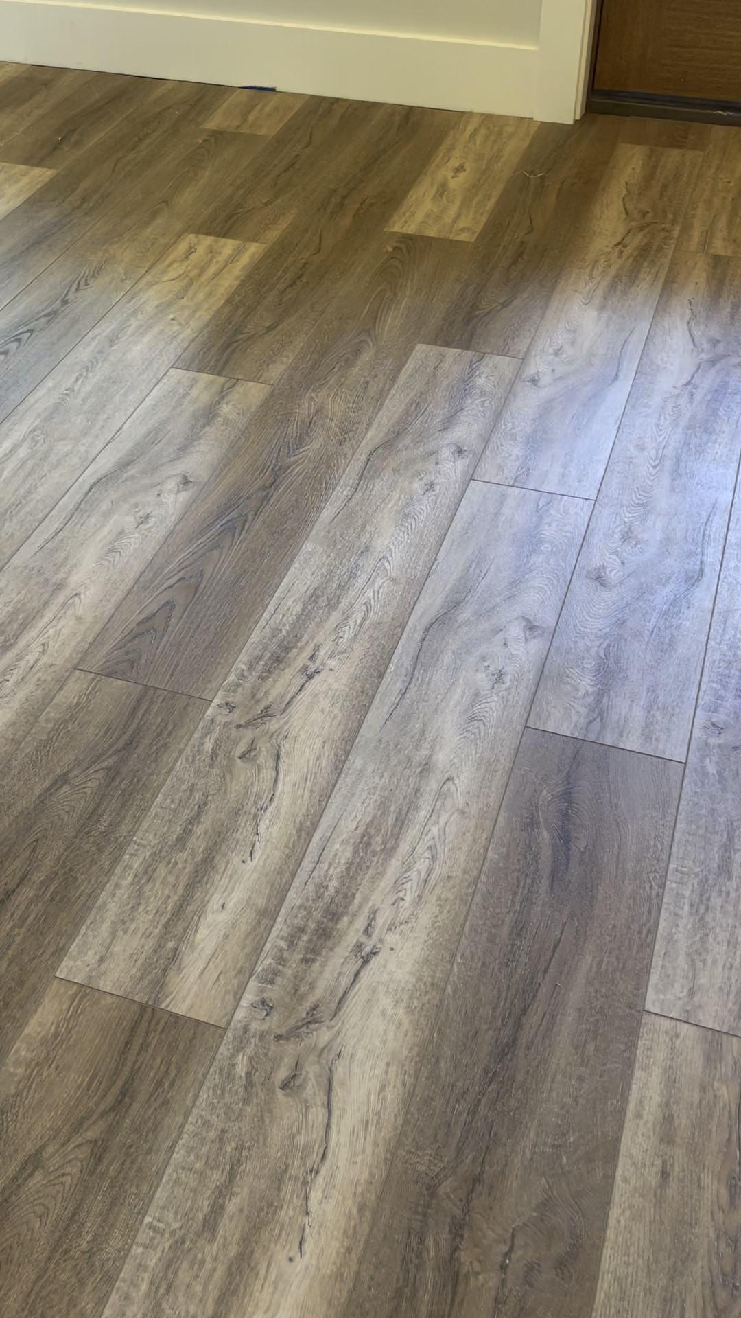 Shaw LVP Flooring 
This beautiful flooring has beveled edges and it’s textured like a real wood grain. The color variation of lighter to darker wood tones is a perfect pairing! 

LVP, Luxury Vinyl Plank, Flooring, Waterproof, interlocking

#LTKHome