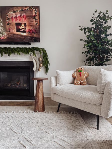 Giving this boucle arm chair the moment it deserves. 

Living room, coffee table, farmhouse, modern, transitional, layered rug, jute rug, Chris loves Julia rug, Loloi rug, Christmas garland, Christmas mantle decor, Christmas tree, King of Christmas, fireplace decor, holiday decor, winter stems, round coffee table decor

#LTKHoliday #LTKhome #LTKSeasonal
