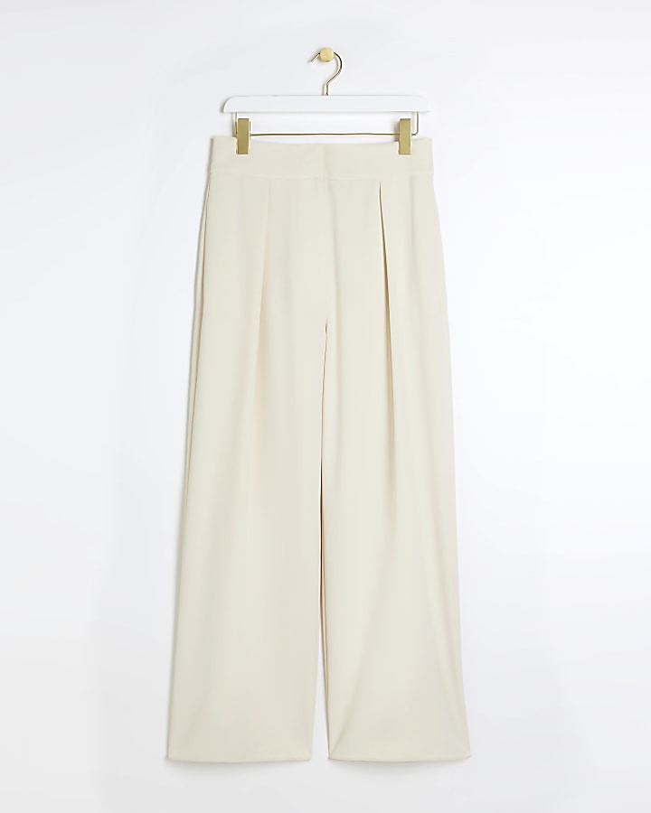 Cream pleated wide leg trousers | River Island (UK & IE)