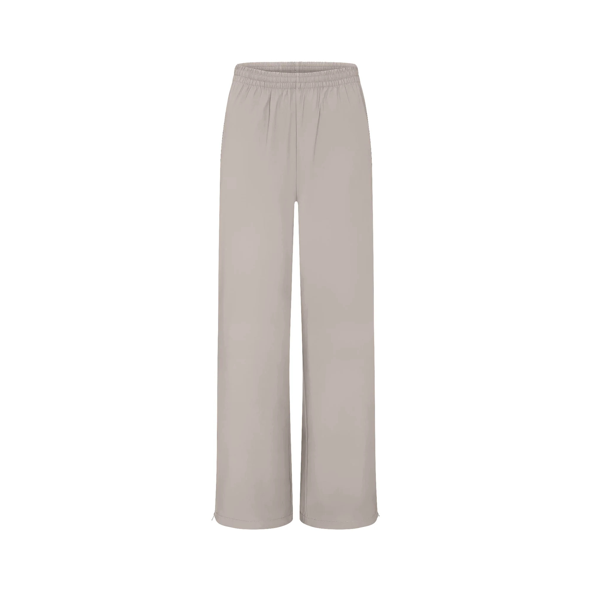 NikeSKIMS WOVEN NYLON OVERSIZED TRACK PANT | STONE | SKIMS (US)