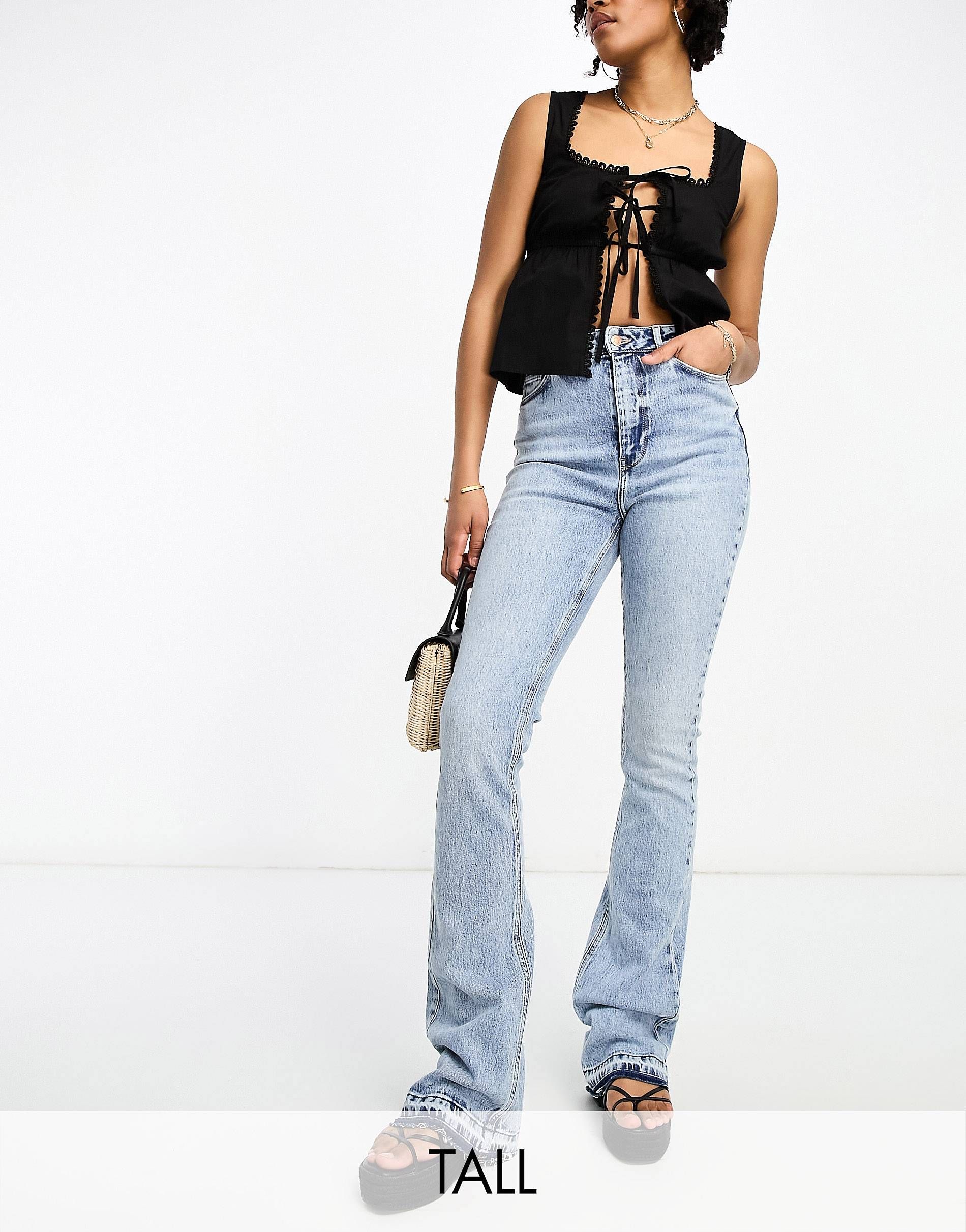 New Look Tall acid wash flared leg jean with hem detail in blue | ASOS (Global)