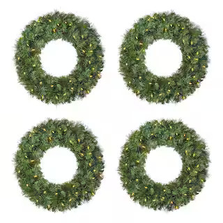 Home Accents Holiday 24 in. Wesley Long Needle Pine LED Pre-Lit Artificial Christmas Wreath (4 Pa... | The Home Depot