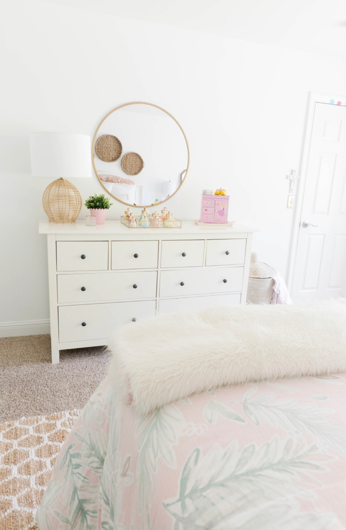 This pink and white girls bedroom is cute without being cluttered. A super affordable white dresser, jute rug and round mirror all complete the look! 


#LTKHome #LTKFindsUnder50 #LTKSaleAlert