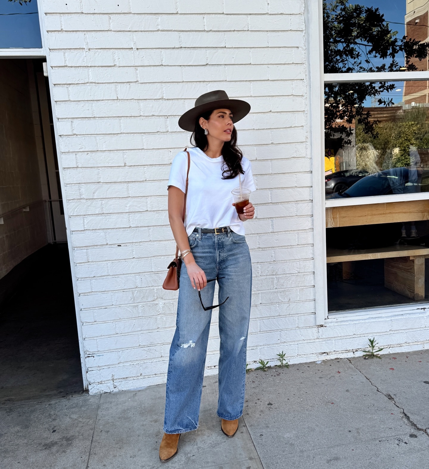 Very LA Sunday. ☀️ My first @lakers game and it was so much fun. And of course it wouldn’t be a Lakers game without a few celebrity sightings. Followed by coffee at one of my favorite DTLA spots. @marucoffeela Wearing relaxed slightly distressed denim, a white tee under $50, cowboy hat & suede boots — because it’s so hot it basically feels like summer in LA.
My handbag is borrowed from @Vivrelle and you can get 1 month free membership with my discount code: DIANACAROLINA 

#LTKdayinmylife #LTKootd #LTKstorytime