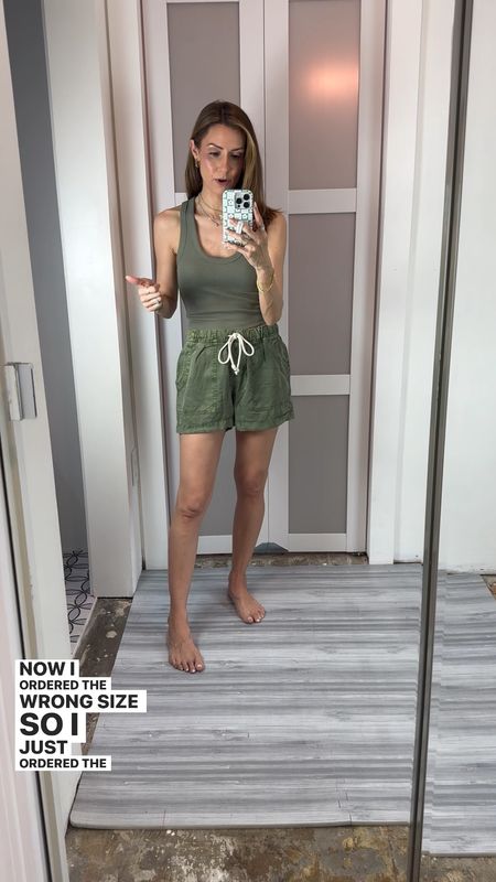 Just discovered these olive green shorts and they are so comfy! I’d pair a different shirt with it but didn’t feel like changing for one look 😆 I’m going back for the correct size. Love that they have a working drawstring, love the length, and the comfort is a 20/10! I’m wearing an XS here but I’m going back for the XXS for a more flattering fit! 

#LTKfindsunder50 #LTKtravel #LTKVideo