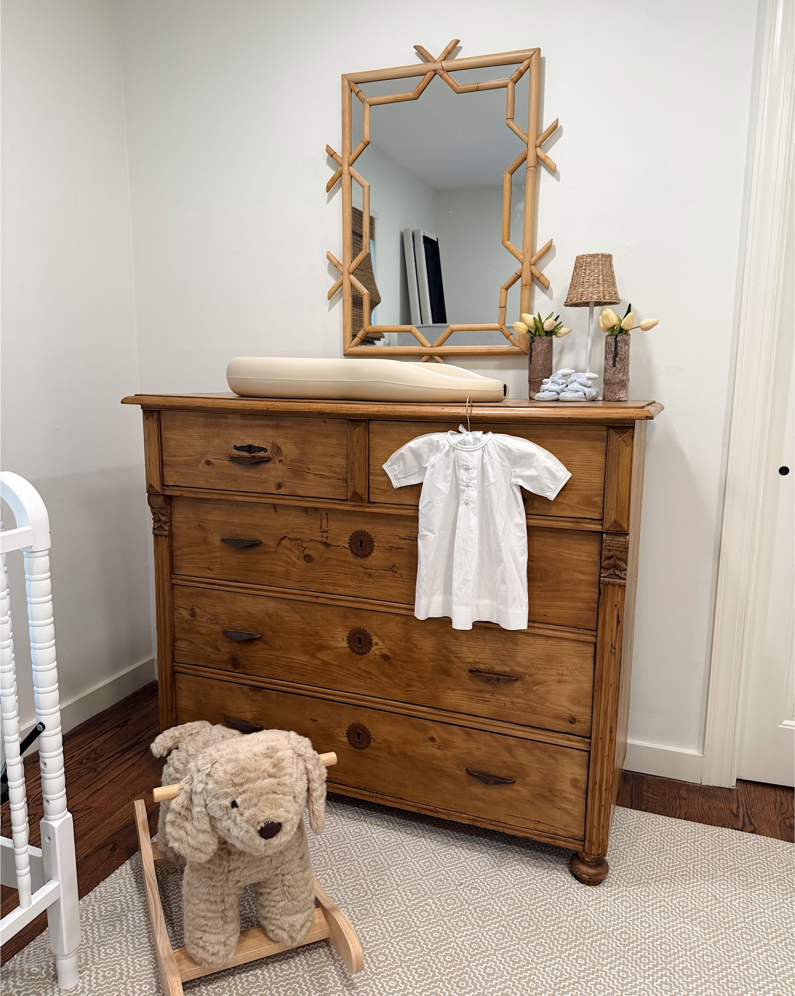 Nesting ———🫶🏻 Two happy little corners of baby brother’s room! Chest: barn yard antiques
Chair: mae davis (linked in my insta bio)
 
I have to give FULL credit to all design inspo for this nursery to @elisabethandbutter —— well before I ever was even pregnant with Eloise I fell in love with her son’s nursery. She has a gift of mixing high & low items & knowing where to splurge. Her design taste has always been my favorite. 
 
Here’s where I’ve splurged & saved so far! 
 
Saves: crib, rug + rug pad, floor lamp + new shade (sourced by my SIL who also helps with all my interior inspo)
Splurge: THE CHAIR @maedavisinteriors (a must splurge - I “saved” on Eloise’s chair & I regret it to this day), antique pine chest & bamboo mirror 
 
#nursery #nurseryinspo #nesting #babyboy #twoundertwo 

#LTKBaby #LTKKids #LTKBump