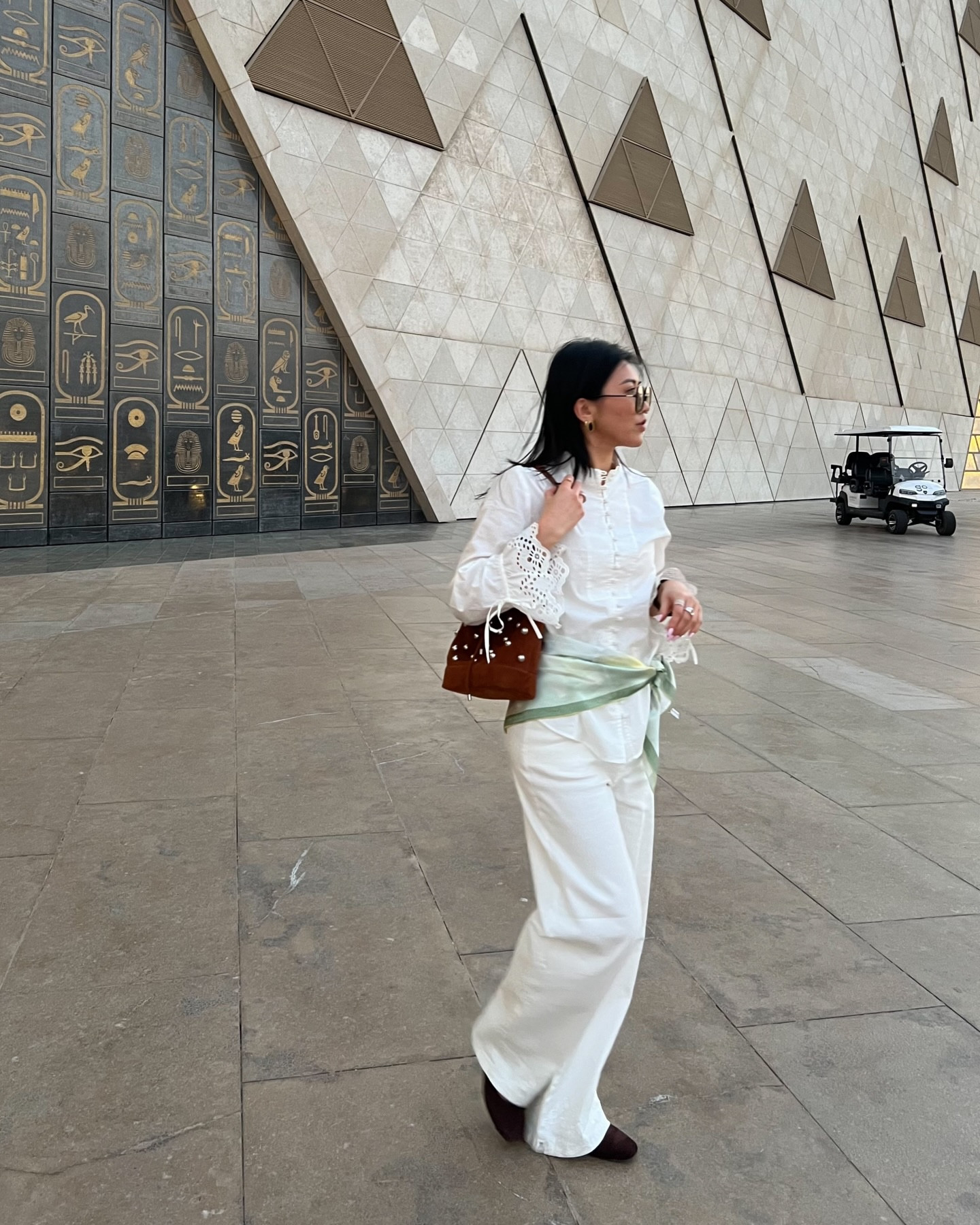 Hours lost inside the Grand Egyptian Museum, completely in awe of the rich history and everything in front of me

Kept it minimal for the look, white shirt, silk scarf, lots of accessories, and  flats for a full day on my feet

Easy, breezy, and quietly one of my favorite days in Cairo. 

Comment SHOP below to receive a DM with the link to this post on my LTK ⬇ https://liketk.it/63Kfz 

Saved and followed @shaythelight for more spring look inspo.

#springoutfit #springfashion #streetphotography #travellook #minimalootd