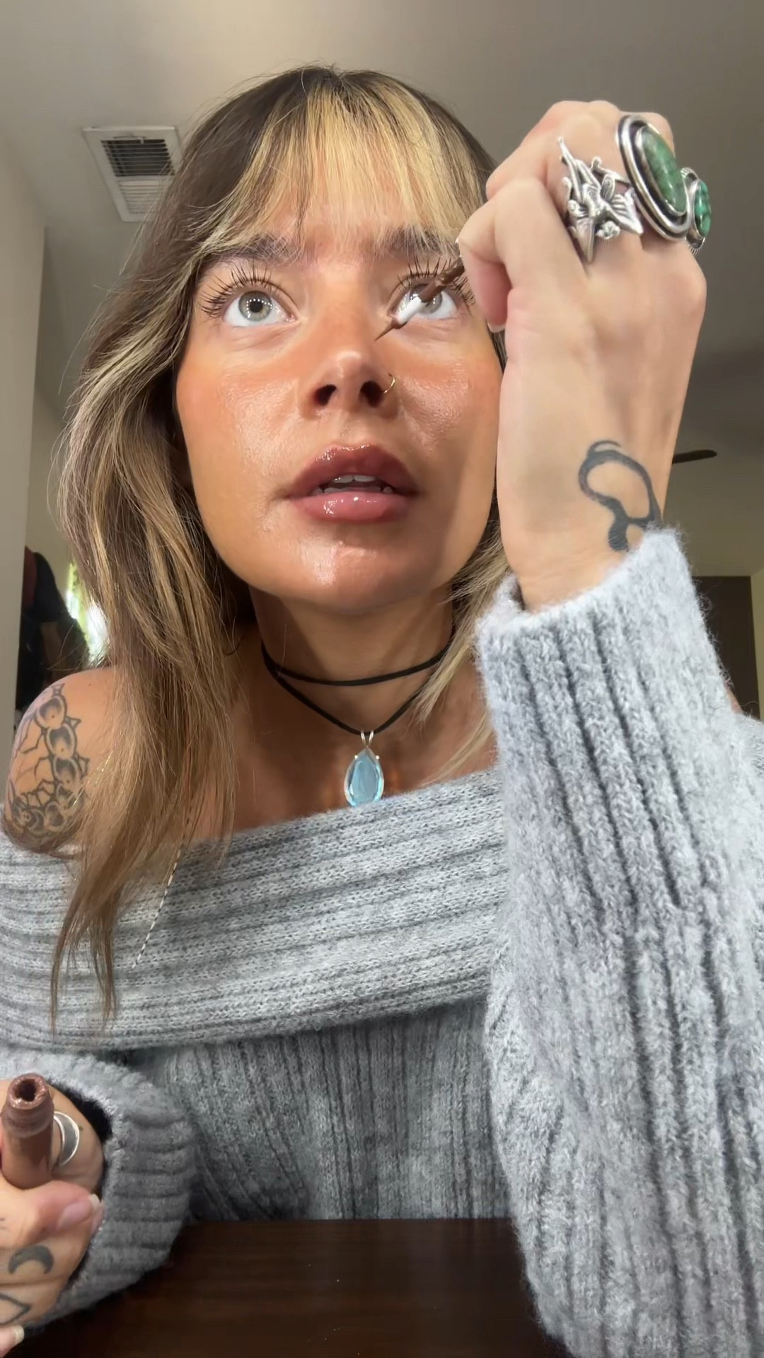 My freckle pen & my sweater🩶

#makeup #clothing #fallclothing #winterclothing 

#LTKStyleTip #LTKBeauty #LTKSaleAlert