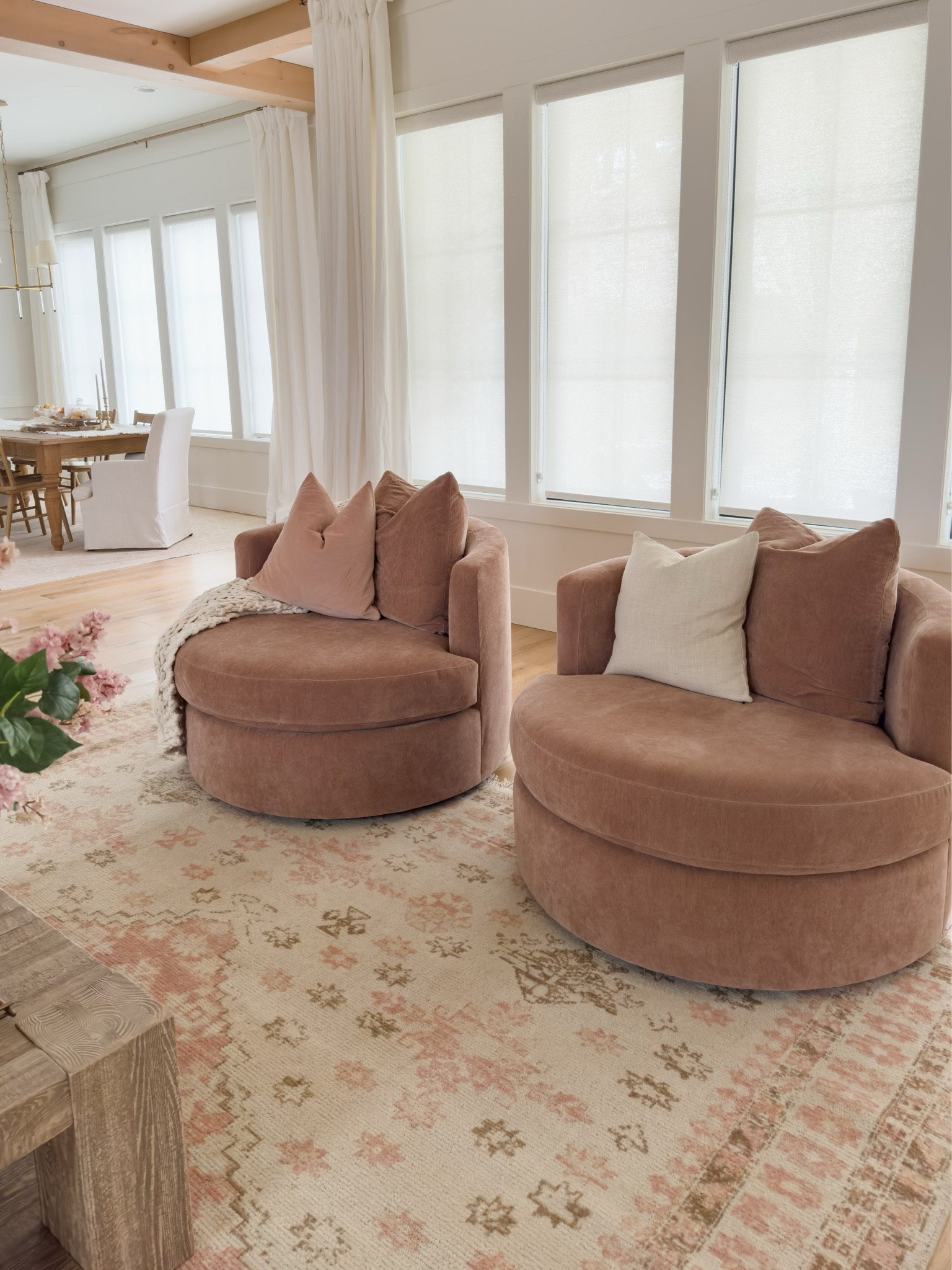 One of my favorite details in the living room are these stunning rosewood accent chairs. They are so comfortable and compliment the pops of pink incorporated throughout 

Living room refresh, spring refresh, open concept living, creamy whites, natural wood tones, accent chair, pops of pink, my design style, light and bright, spring throw pillow, neutral area rug, vintage inspired area rug, coffee table faves, curtain details, Pottery Barn style, spring living room, shop the look!

#LTKSeasonal #LTKhome #LTKstyletip