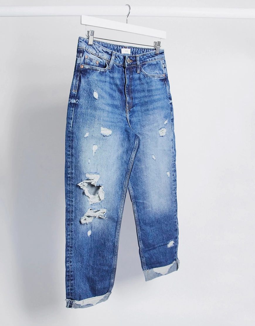 River Island Carrie ripped mom jeans in mid blue | ASOS (Global)