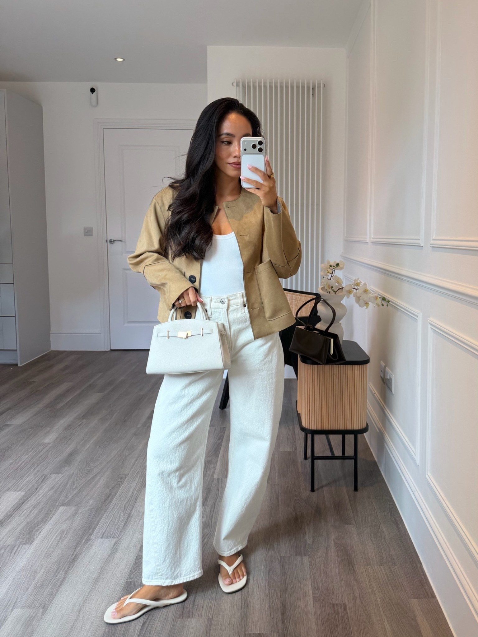 Transitional outfit of the day 🍂 

Cream barrel jeans, white vest, faux suede jacket, DeMellier Mini Hudson, thong sandals

#LTKuk #LTKautumn #LTKstyletip