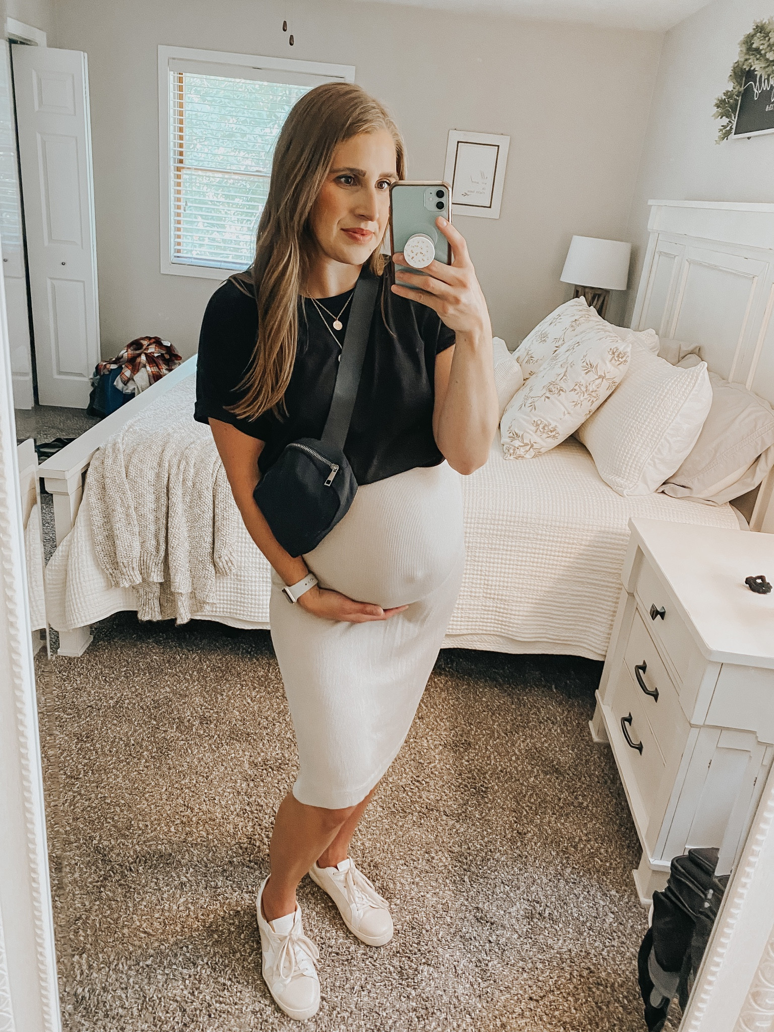 Bump friendly. Transitional outfit. Fall outfit. Fall dress. Basic dress. Fall basics. Midi dress. Neutral midi dress. Ribbed midi dress. White sneakers. Basic top. Black tee. Black top. Bum bag. Belt bag. Black bag. Crossbody bag. 

#LTKSeasonal #LTKstyletip #LTKbump