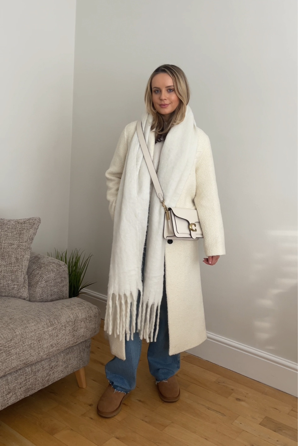 Neutral outfit neutral fashion winter whites winter outfit. Cream boucle coat, cream cropped jumper, ultra mini Uggs, coach tabby bag chunky knit scarf 

#LTKSeasonal #LTKMostLoved #LTKeurope