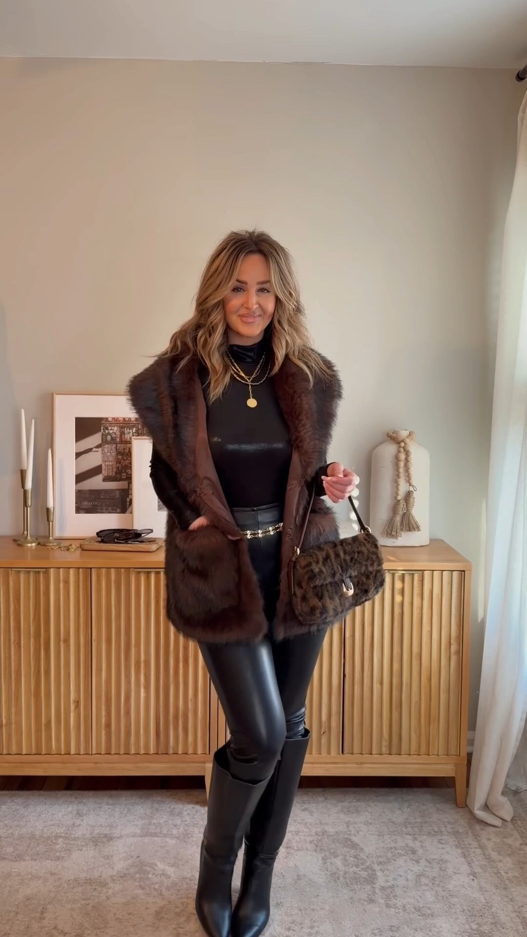 MY FUR VEST JUST RESTOCKED‼️ HOLIDAY OUTFIT IDEA that’s not a dress or skirt! everything is 35% off with LEANN35✨ ANY type of faux fur layer, an all black outfit, faux leather leggings, chain belt & fun handbag! my vest is sold out, but linking a bunch of faux fur options. 

#LTKFindsUnder100 #LTKootd