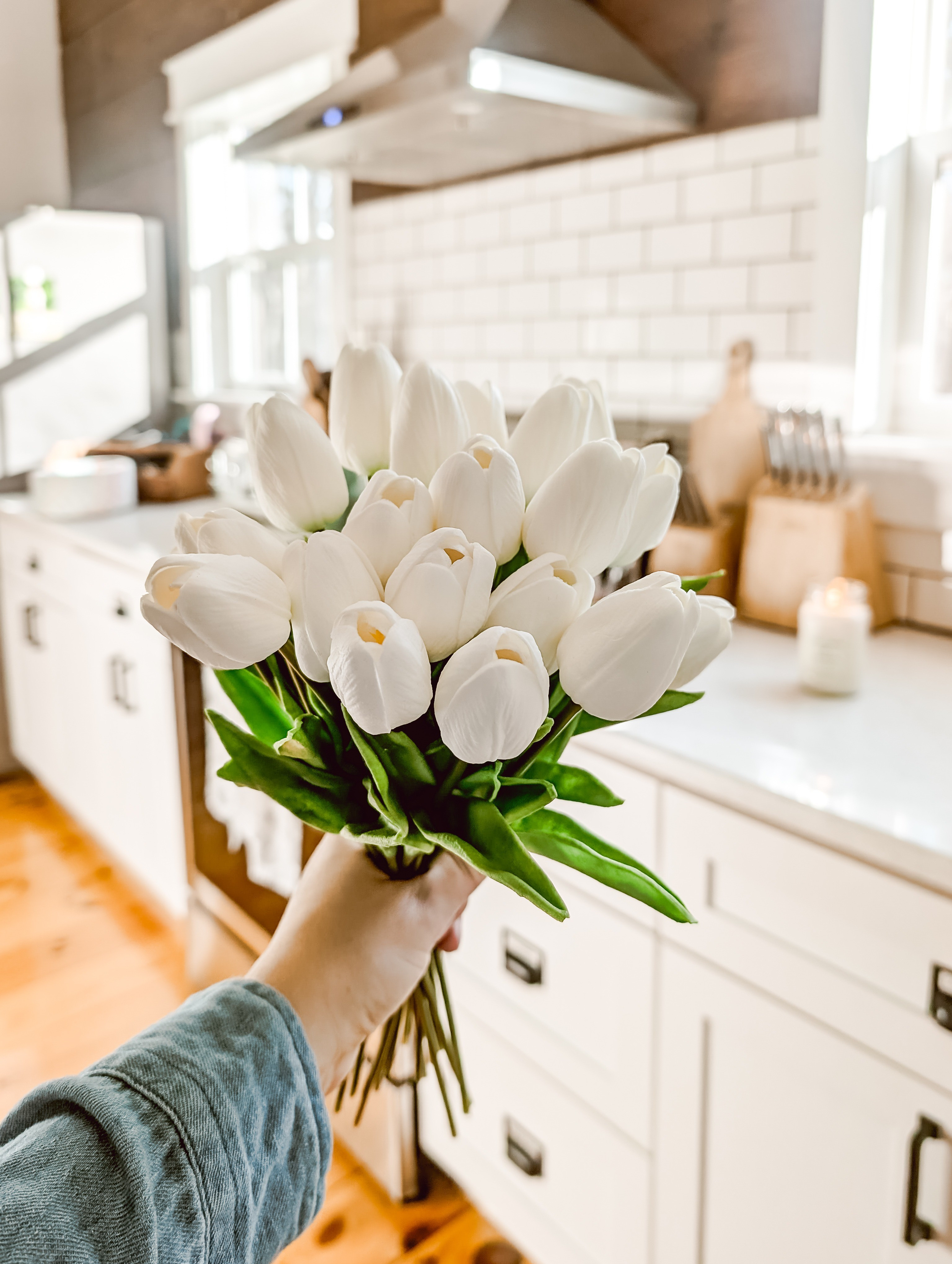 These faux white tulips are so beautiful and life-like in person! They're the perfect spring stems!! Can't wait to fluff them and find a pretty jar or vase to style them in.  

 #LTKSeasonal #LTKHome