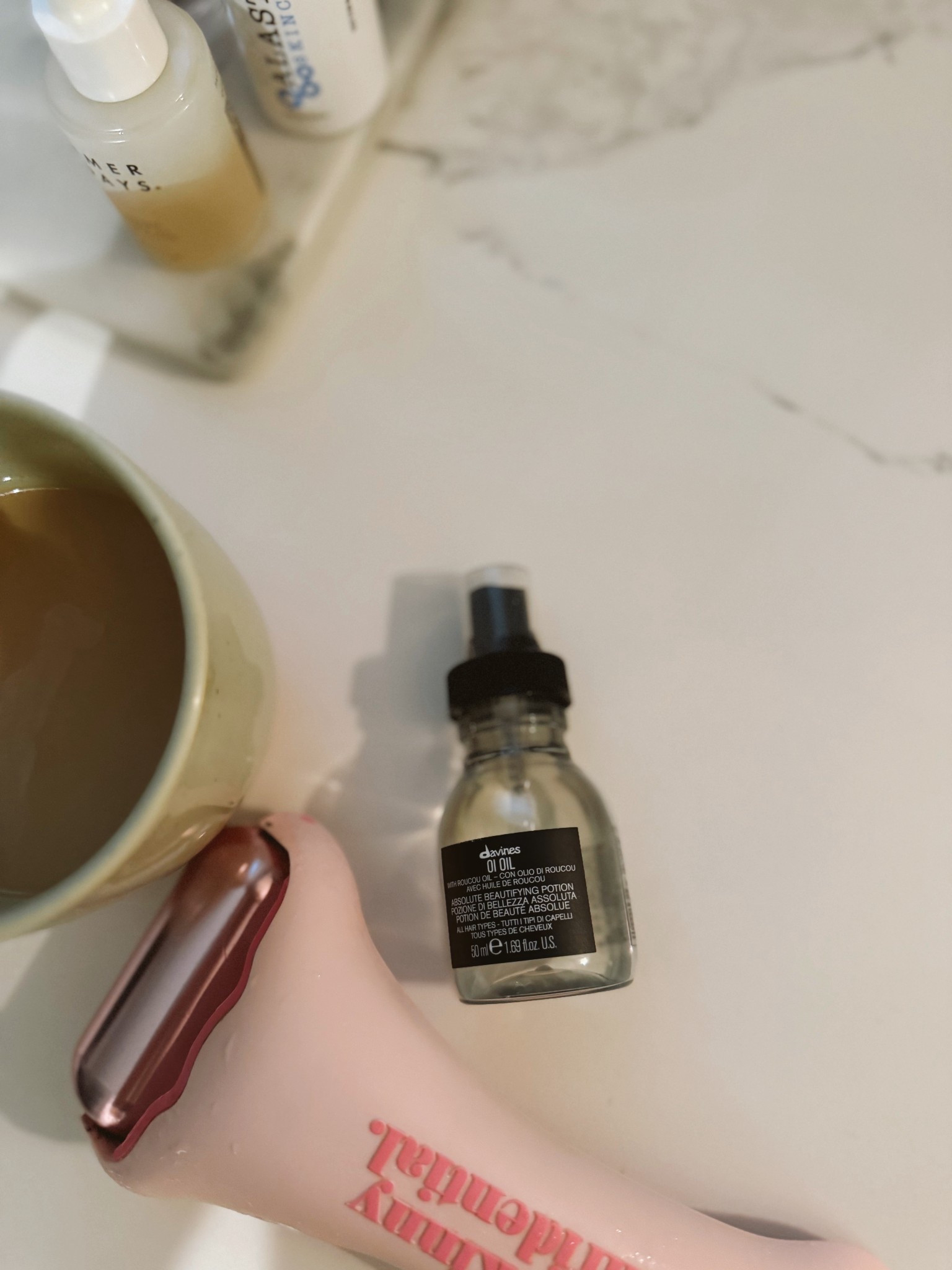 A little davines OI Oil in my hair before stepping into the hot studio. 