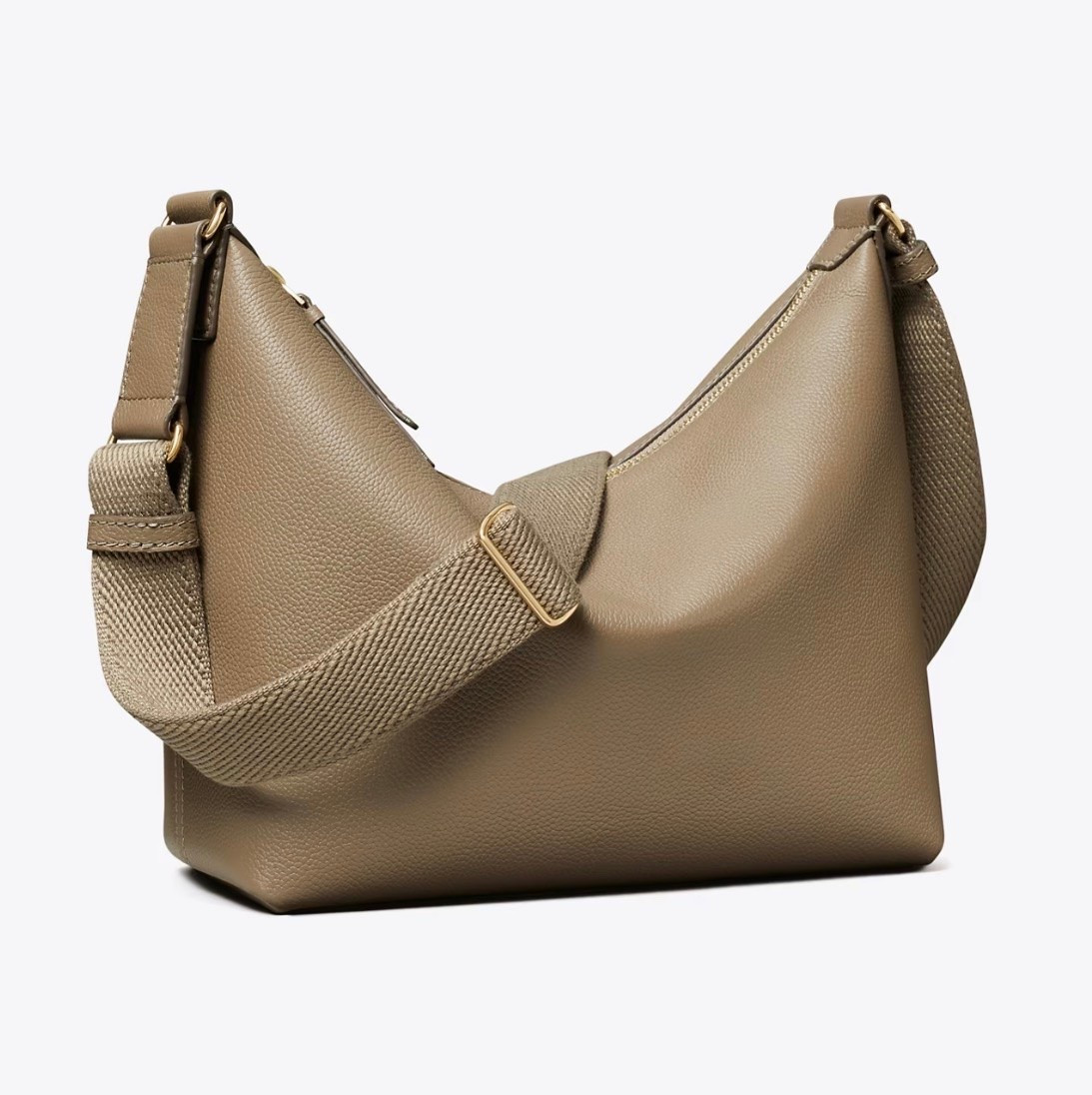 LEATHER SLOUCHY CROSSBODY
Tory Burch sale going on now!

Easy, understated and softly structured. Cool tonal stitching anchors pebbled leather silhouettes with a relaxed 70s sensibility

#LTKootd #LTKTravel #LTKWorkwear