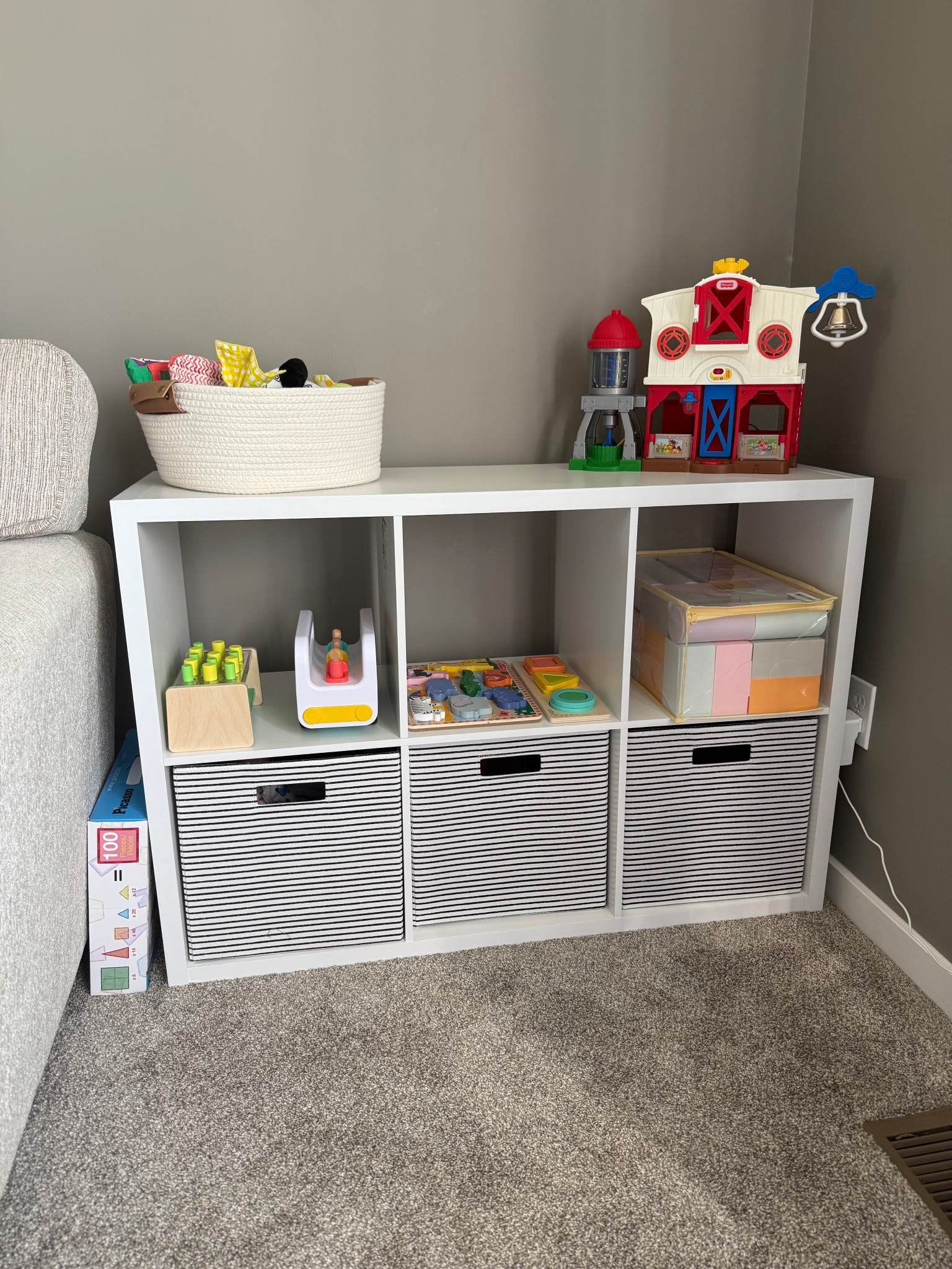 Living Room Playspace! We spend lots of time in our living room so I was in need of my kids toys to look nice and organized! This shelf from #target was the perfect find.


#babytoys #toddlertoys #toyorganization #toystorage #homestorage #targetfinds #organizedhome #kidsplayspace 

#LTKHome #LTKBaby #LTKKids
