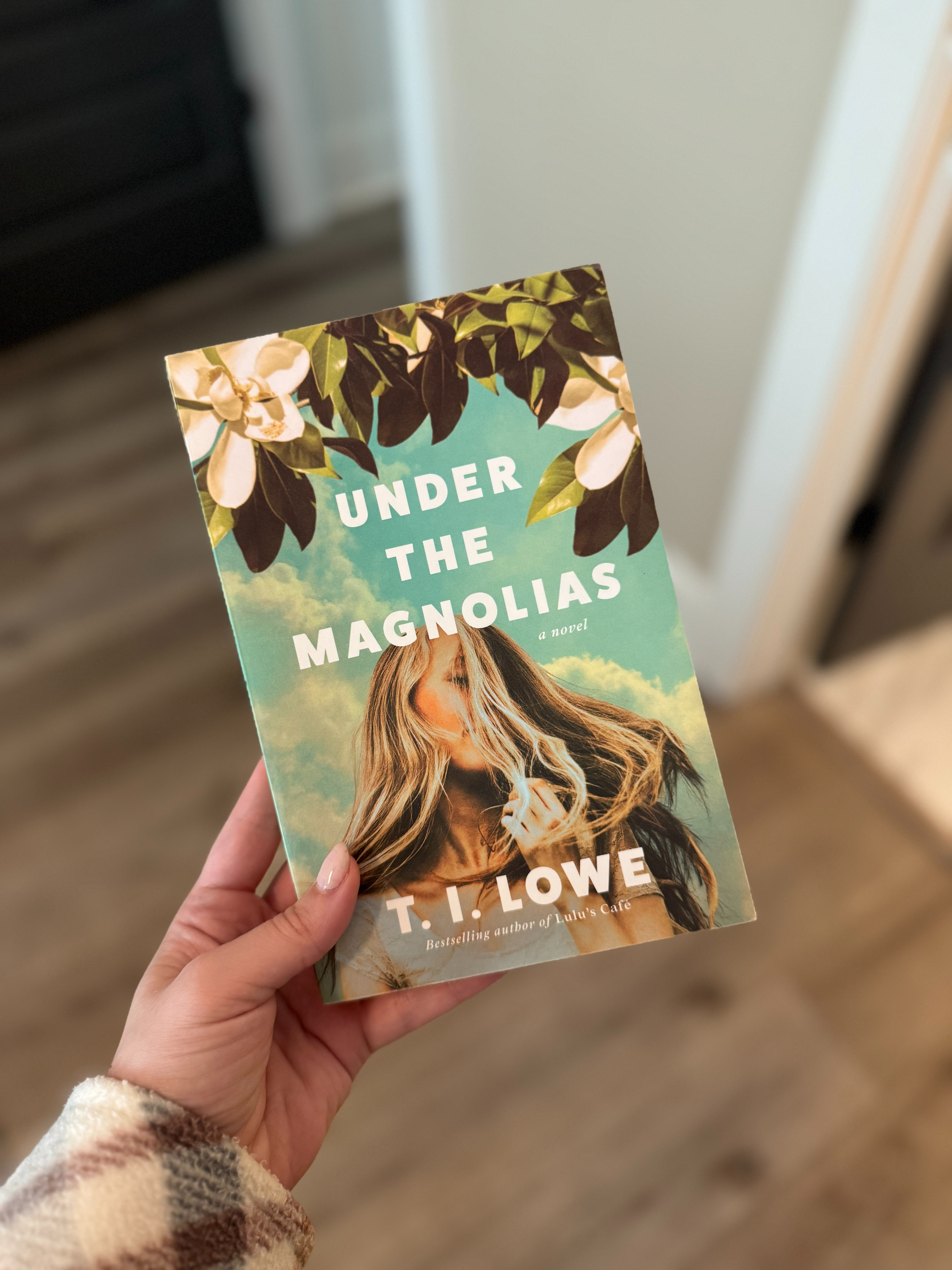 recent read 🤍
Under the Magnolias by T.I. Lowe 

This was such a sweet Southern story 

 #LTKHome