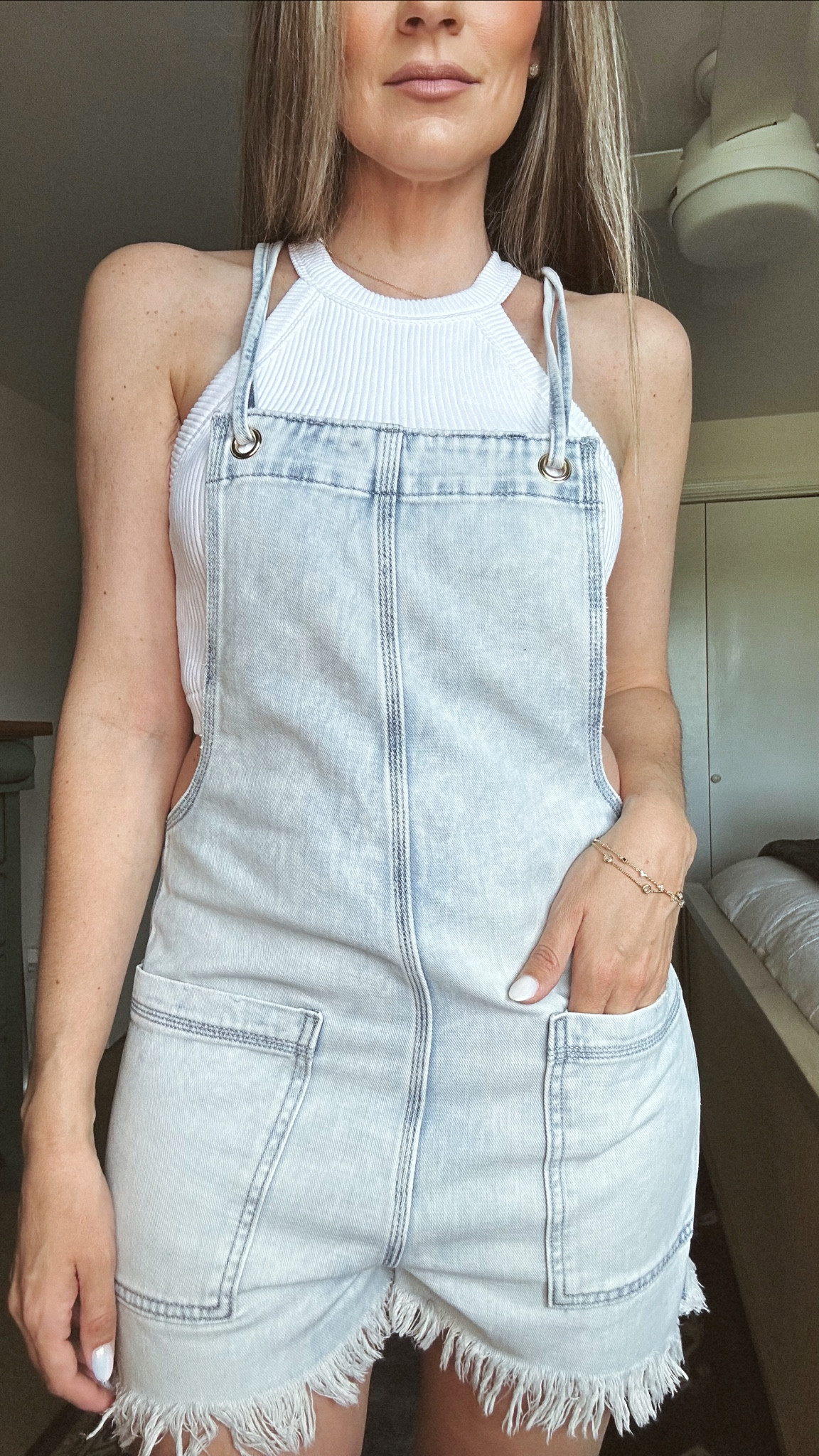 Summer outfit idea: denim shorts overalls and crop top from aerie. This look is so cute and great for travel. Cute country concert outfit too! Wearing size XS.

#LTKsalealert #LTKtravel #LTKSeasonal
