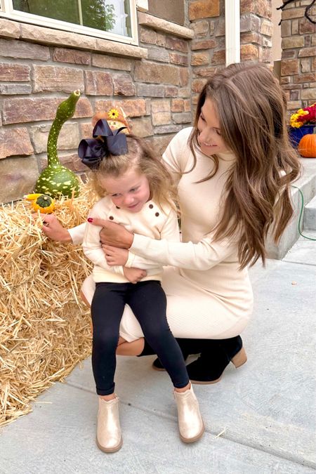 Mom-and-daughter moment! We love our matching neutral sweaters and Fall booties! 

#ShoptheLook #FallOutfitInspo #FamilyPhotoshootIdeas #KidsFallOutfits 

#LTKSeasonal #LTKkids #LTKstyletip