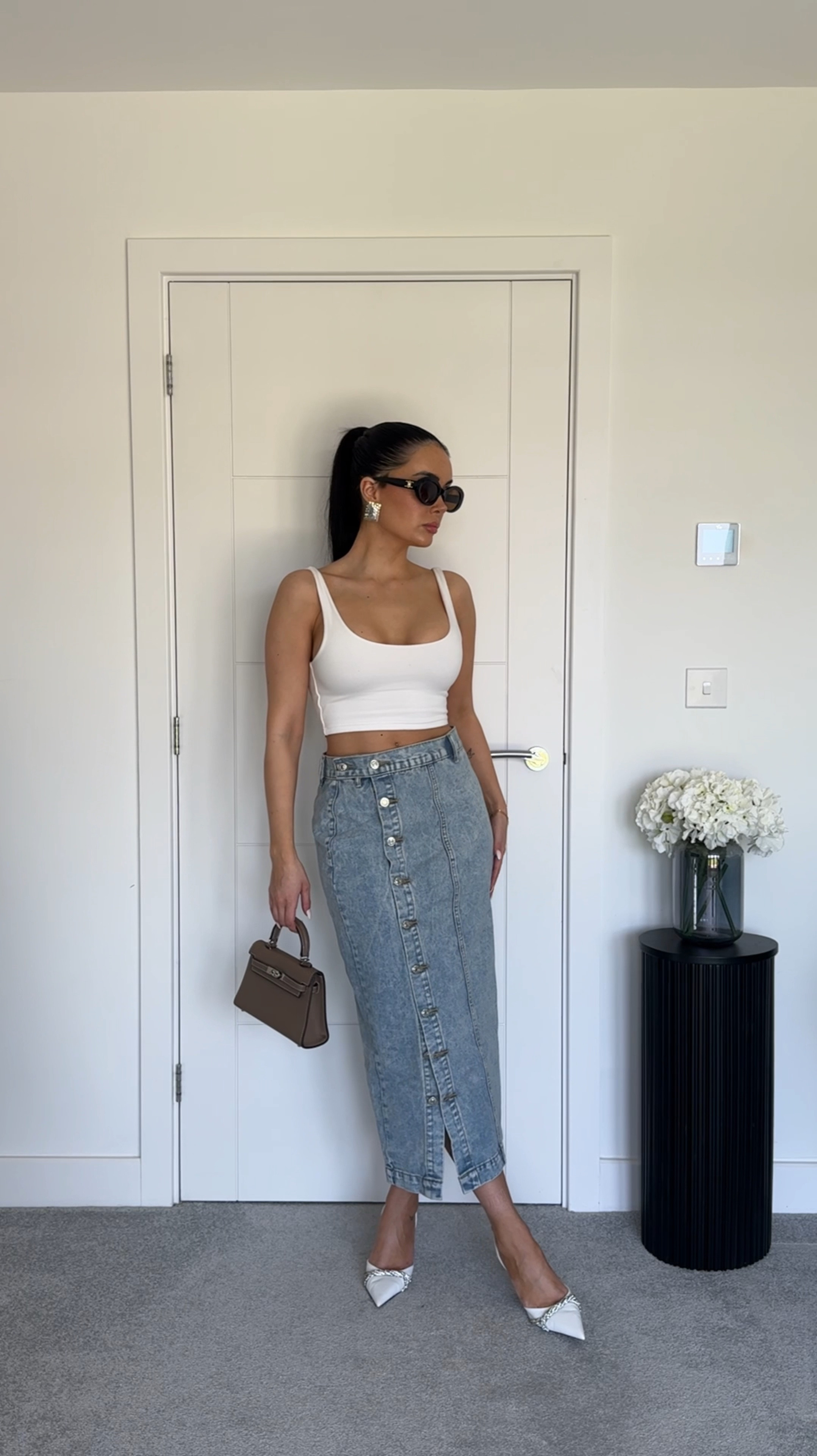 Styling a denim midi skirt 🌸🫶🏼 I’d also recommend getting a cream one as they look stunning with black bodysuits! 

Midi skirt , denim , styling tips , denim midi skirt , long denim skirt , denim maxi skirt , hm , mango , Zara 

#LTKspring #LTKstyletip #LTKsummer