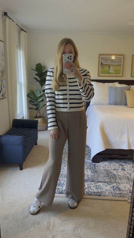 spring casual outfit ideas for work or the weekend!

Navy & white striped sweater jacket is very comfortable and soft. It fits true to size has functional buttons and pockets. Comes in solid colors as well. Currently 15% off!

Work pants are a great lightweight option to get you through summer. Made out of crepe material that is very breathable. For true to size.

Paired with black stripe adidas sneaker, fits true to size 

#LTKSeasonal #LTKfindsunder100