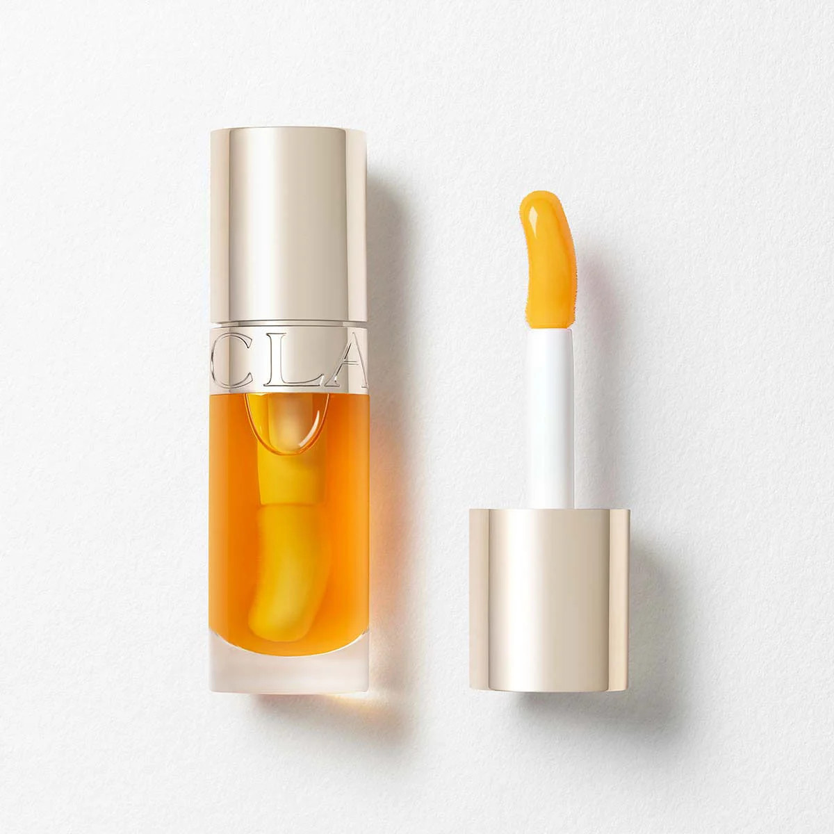 Clarins Lip Comfort Oil Hydrating and Plumping Lip Oil 0.2 Oz. - 01 honey | Clarins USA