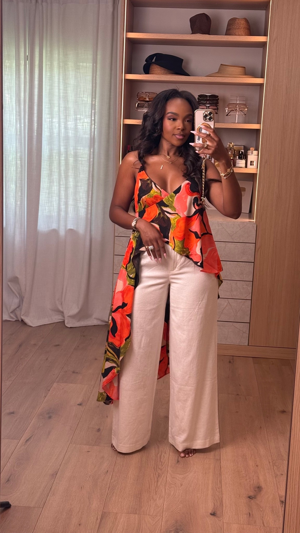 Hi Babes! 🌺

This tropical-inspired top paired with crisp white linen pants is one of those outfits that instantly looks expensive. It's lightweight, flattering, and perfect for warm weather while still feeling effortlessly chic!

✨ Fit Details:
• Wearing a Size Small
• Top is true to size with a flowy, flattering fit
• Linen pants fit true to size with a relaxed wide-leg silhouette
• Lightweight and breathable for hot summer days

🤍 Where to Wear:
• Vacation dinners
• Resort getaways
• Brunch with the girls
• Beachside lunches
• Cruise outfits
• Summer date nights

✨ Style Tip:
Pair it with neutral sandals or wedges, gold jewelry, and a woven or straw bag for the ultimate vacation-ready look.

Everything is linked below!

xx, Kira | IG: KirasFashionFinds

Measurements:
5'4" | Size Small | 140 lbs