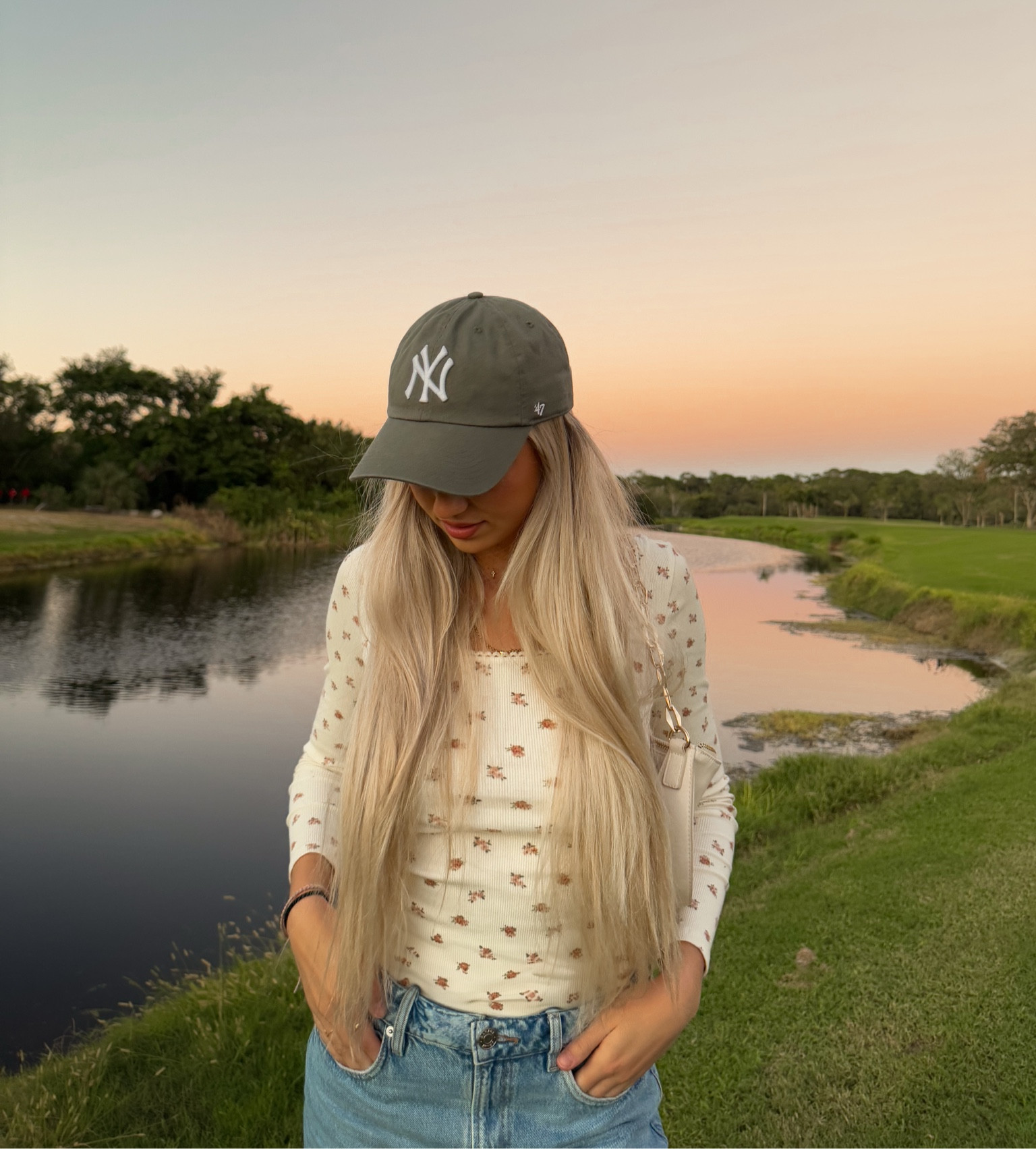 Casual trendy fit <3 
 Baseball cap, long sleeve dainty top, gold purse

#LTKFindsUnder50