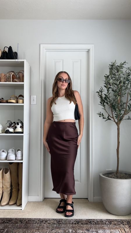 @lindseyressler 5 days of easy summer outfits ☀️⁠
⁠
I am a sucker for a satin midi skirt these days! I love that you can style them both dressy + casual like seen here. Also, can we talk about this gorgeous brown color 🤎😍⁠
⁠
Skirt: S
Top: M
Shoes: TTS 
.⁠
.⁠
.⁠
.⁠
satin midi skirt, summer fashion, summer outfit, outfit inspo, minimal style, fashion inspo, outfit ideas, street style, Pinterest aesthetic, Pinterest girl, styling reels, summer style, summer style, casual chic, casual outfit idea. 

#LTKunder50 #LTKunder100 #LTKstyletip