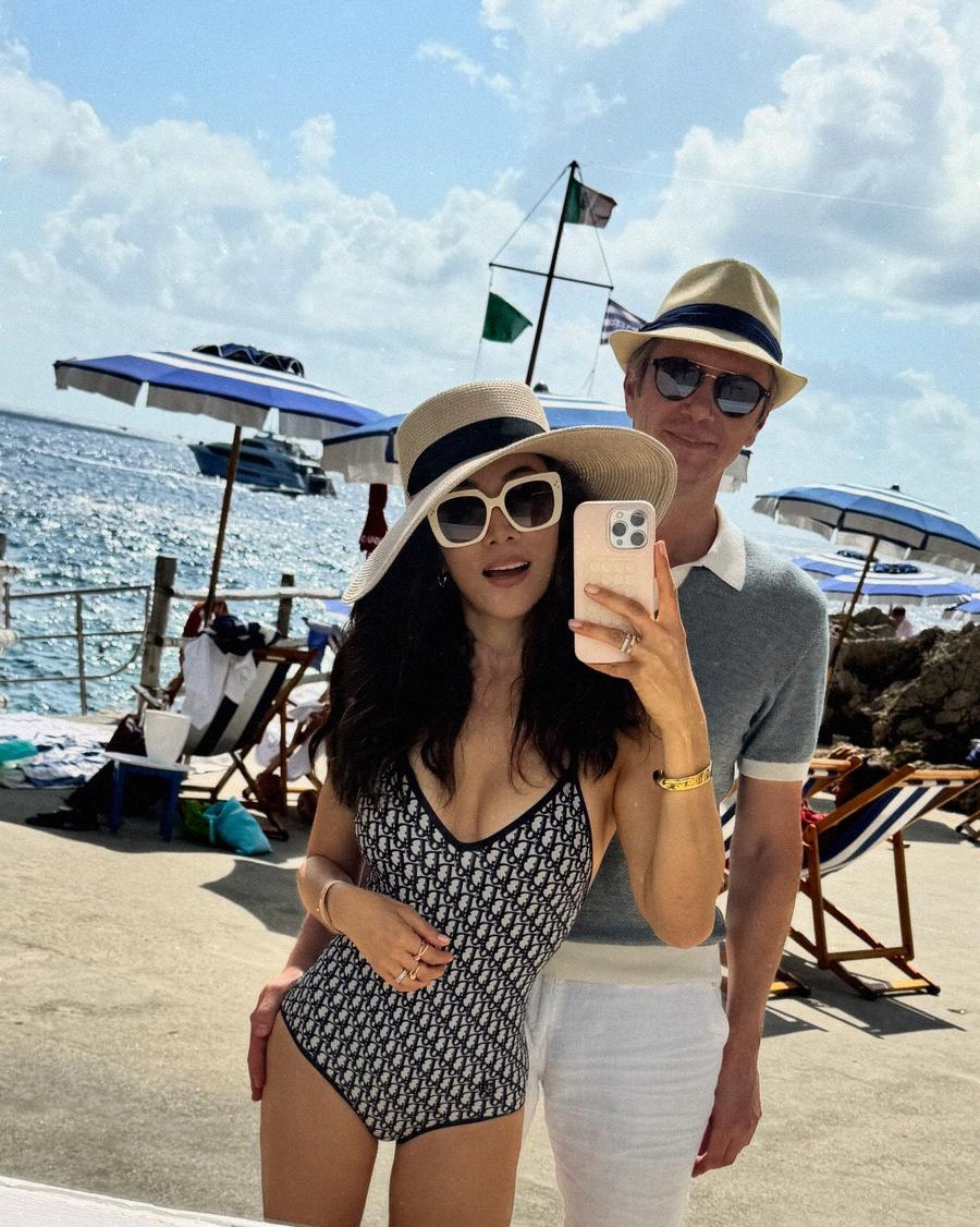 My favorite beach day look this summer. 🌊 This one piece is everything — classic, flattering, and honestly just makes you feel good. 

#beachdayoutfit #onepieceswimsuit #designerswimwear #beachstyle #summerswimsuit #strawhat #couplegoals #over40style

#LTKootd #LTKSwim #LTKOver40